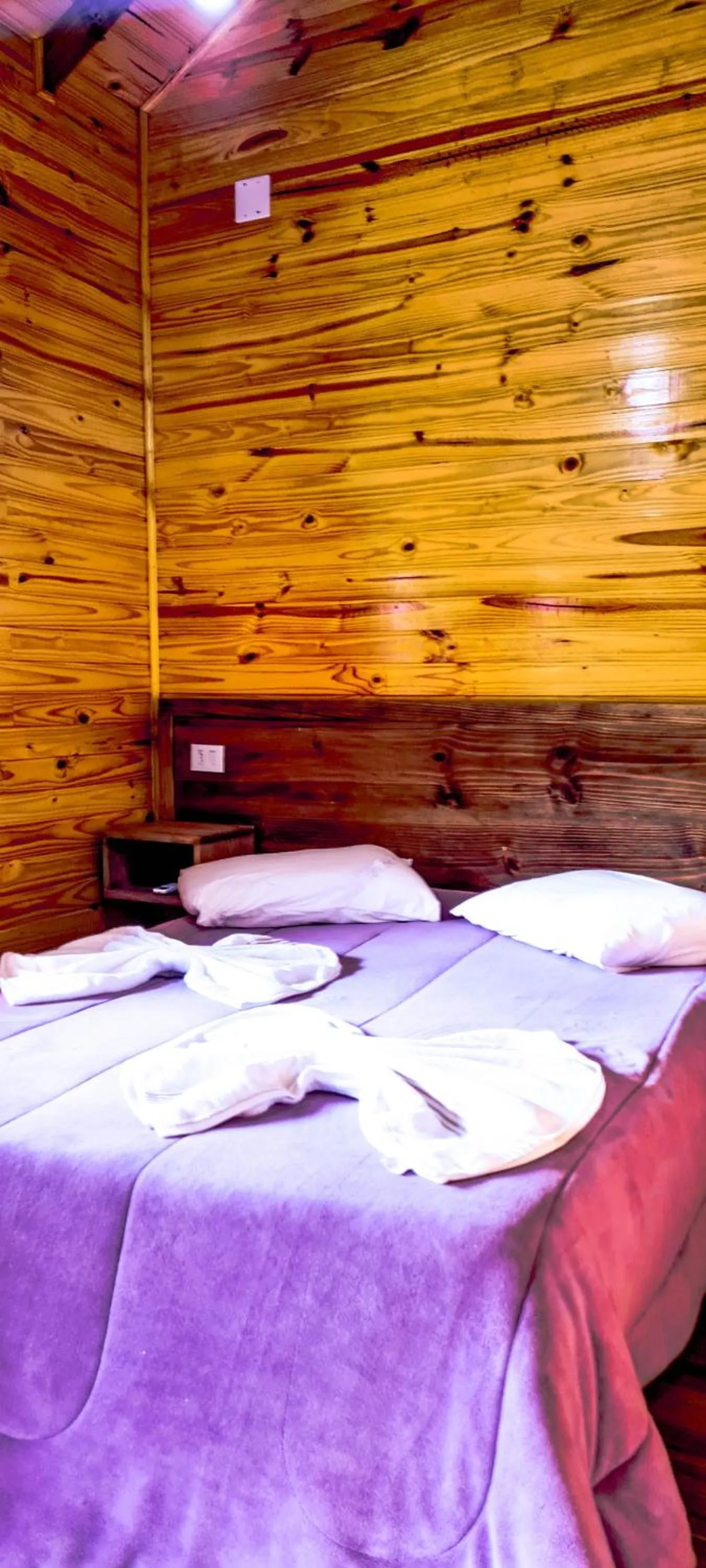 Bed in Pousada Santa Terezinha