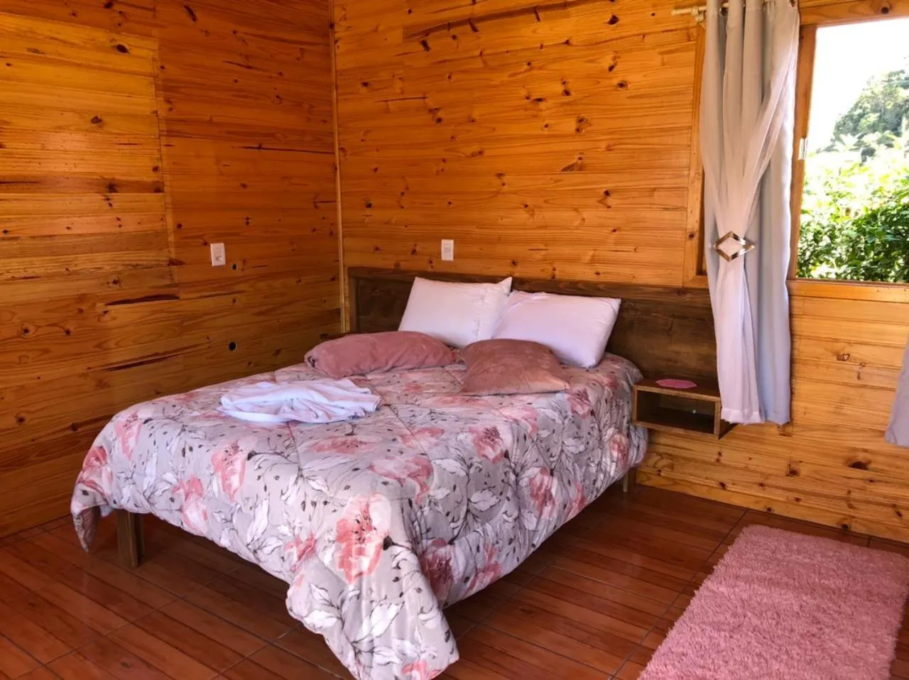 Bed in Pousada Santa Terezinha