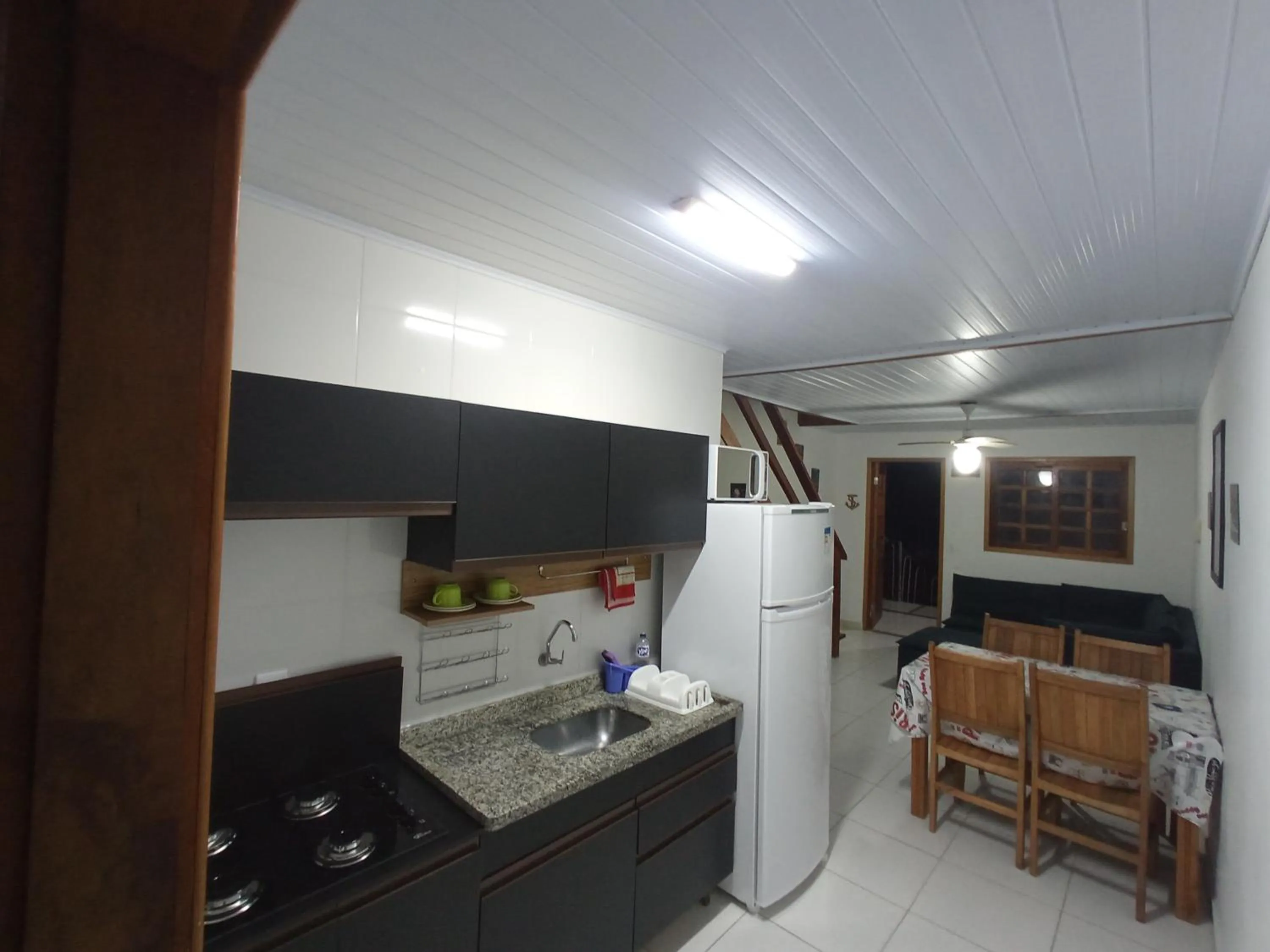 Kitchen or kitchenette in Maranduba Ville II