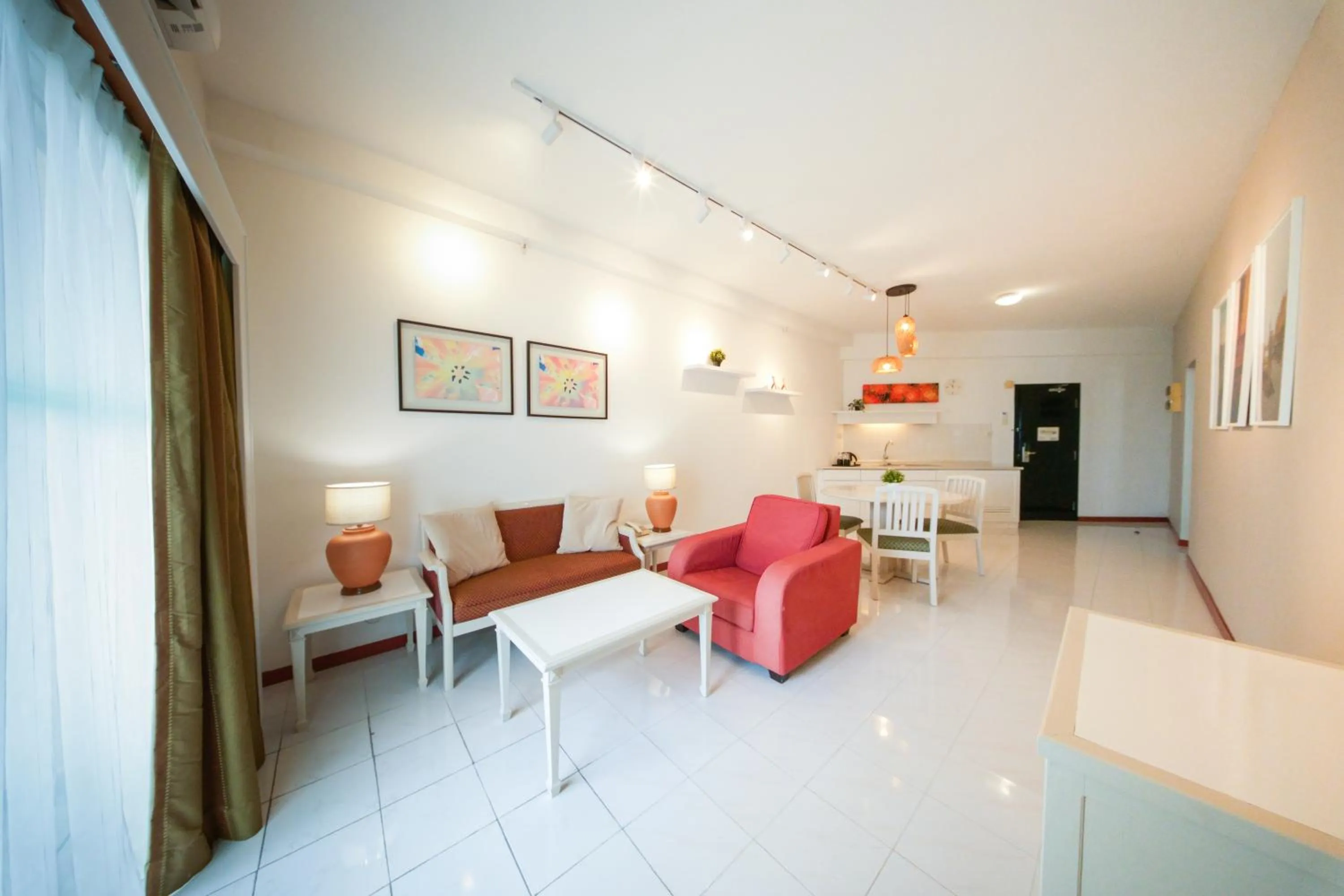 Living room in Rainbow Paradise Beach Resort