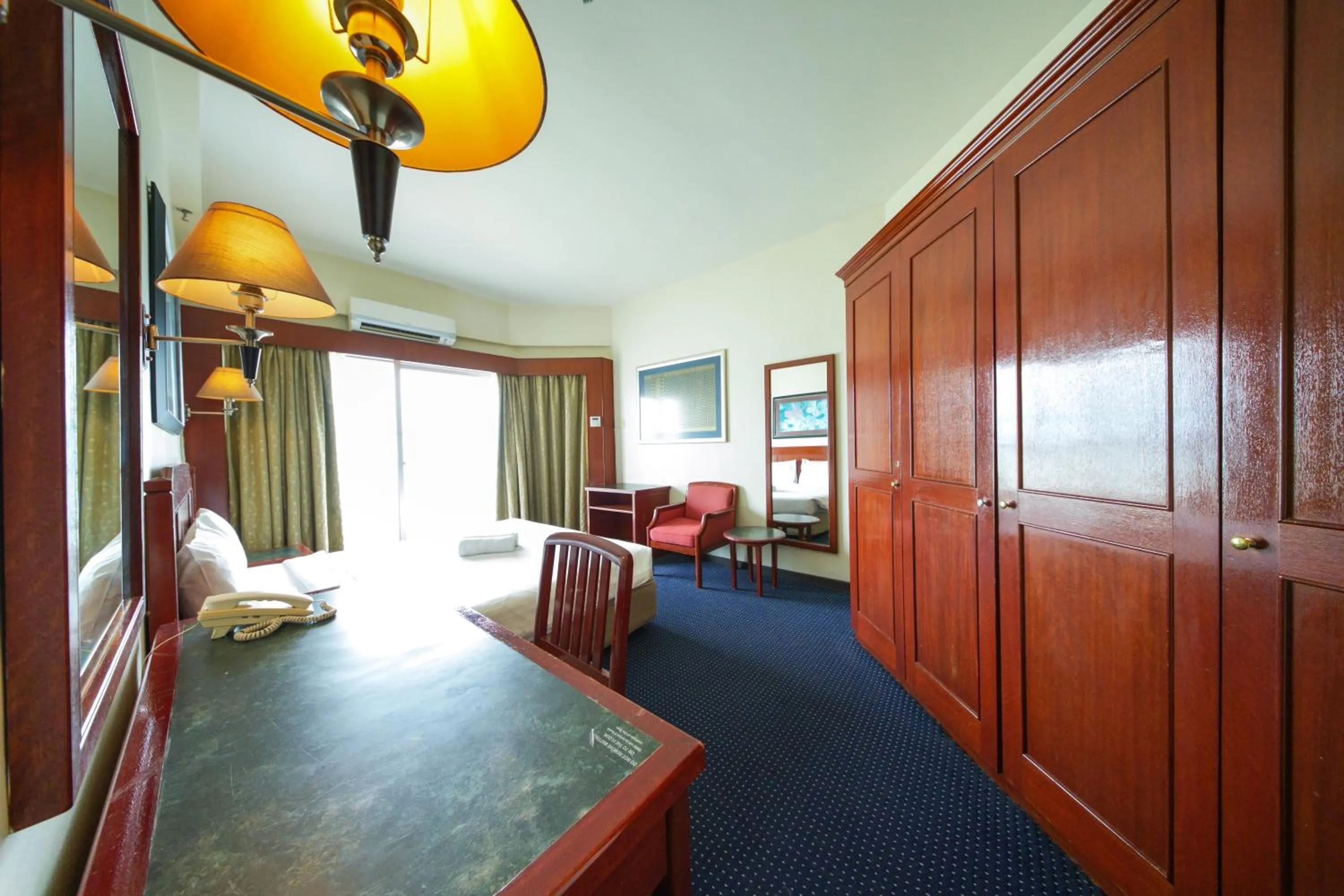 Bedroom in Rainbow Paradise Beach Resort