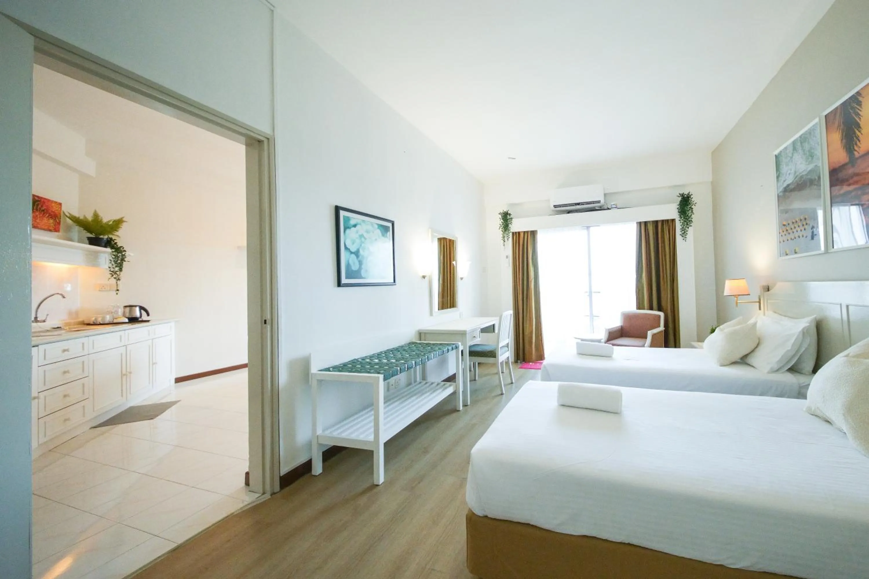 Bedroom in Rainbow Paradise Beach Resort