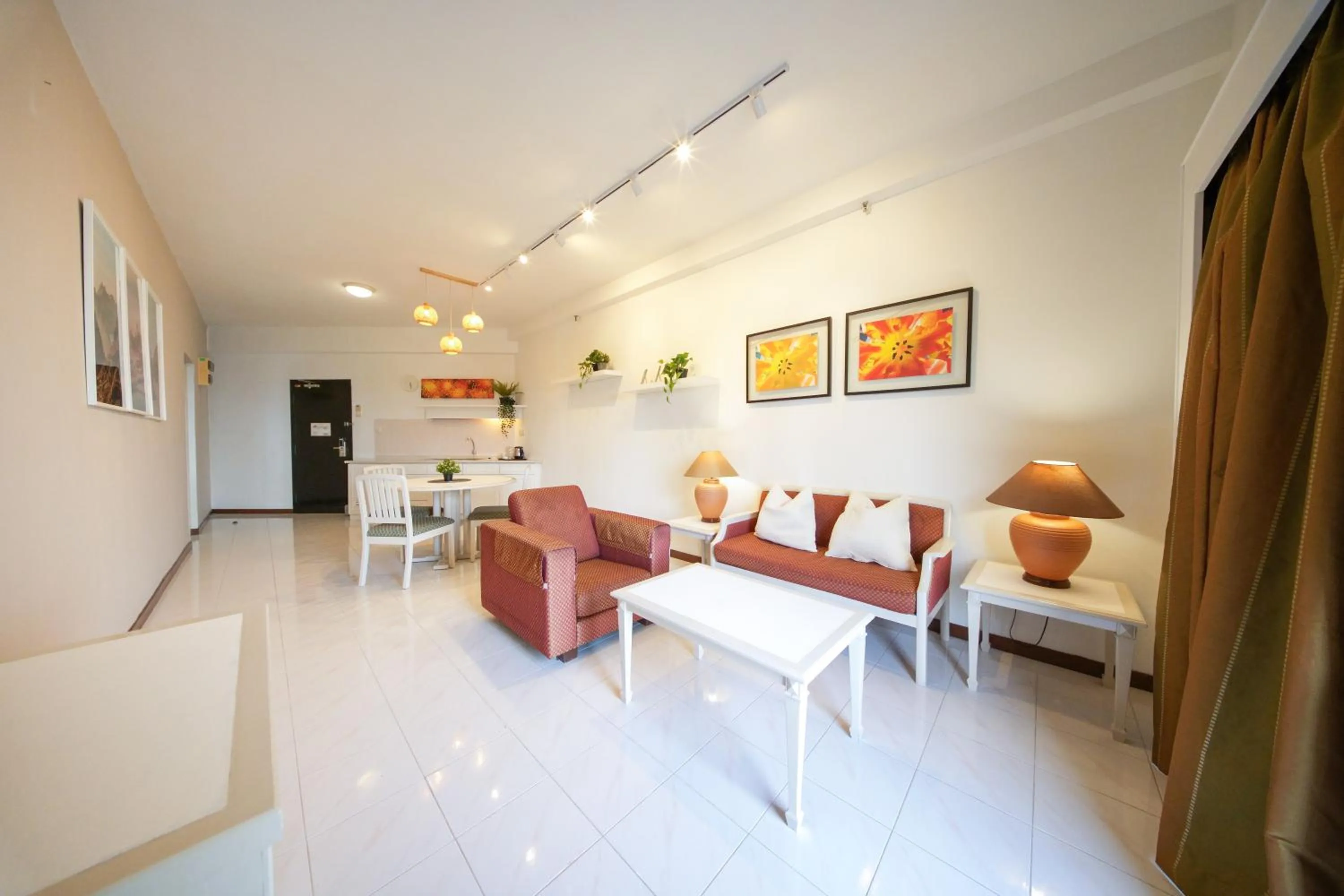 Living room in Rainbow Paradise Beach Resort