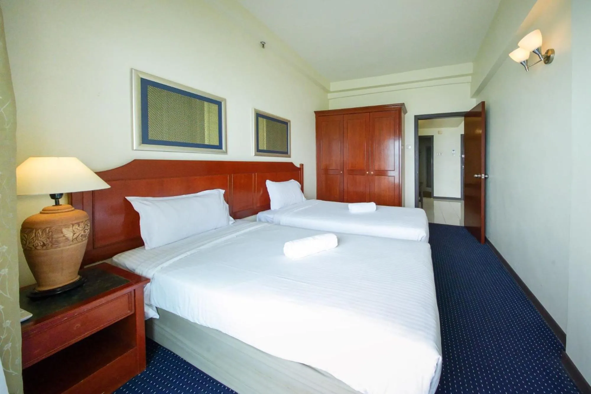 Bedroom in Rainbow Paradise Beach Resort