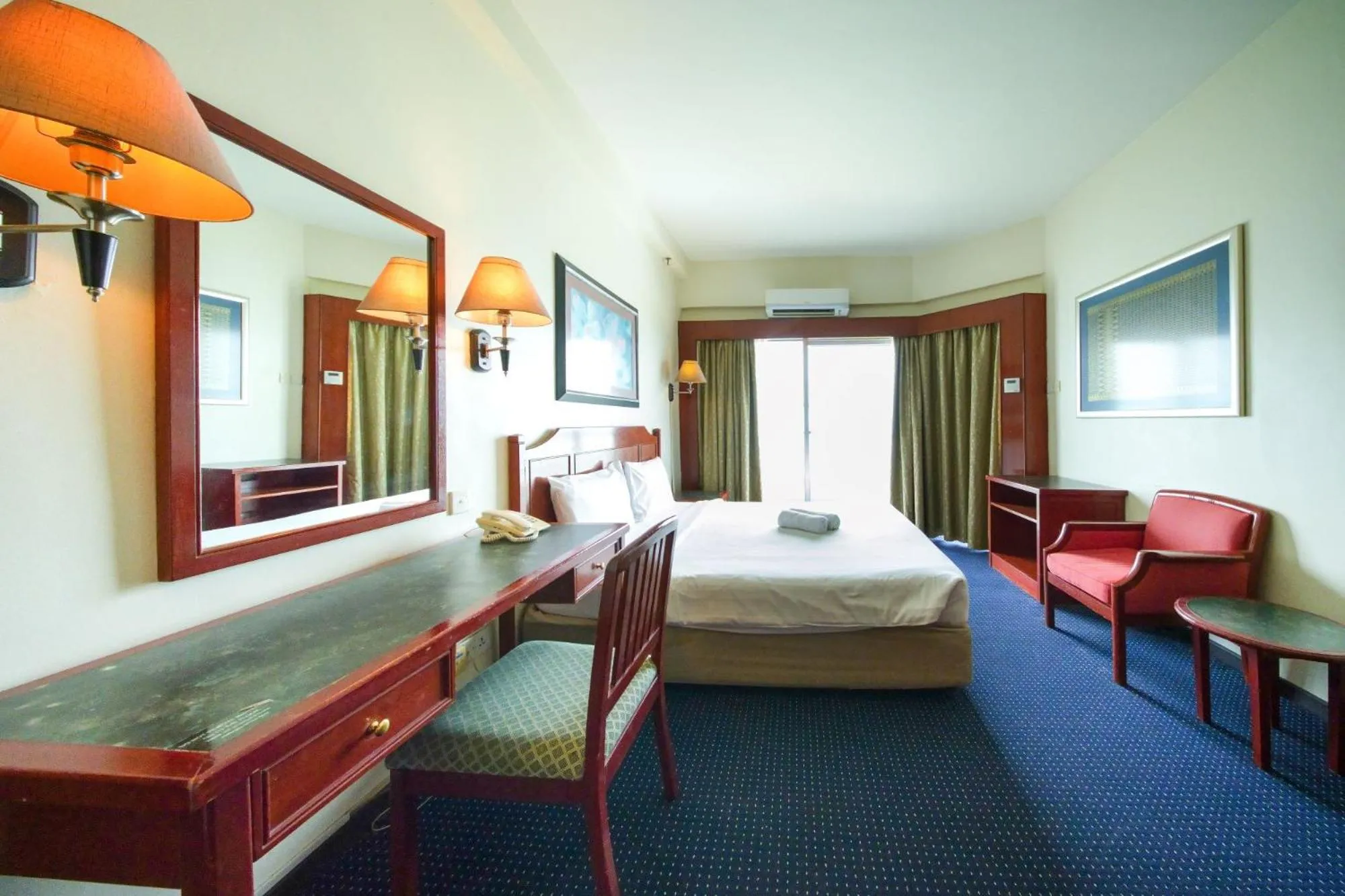 Bedroom in Rainbow Paradise Beach Resort