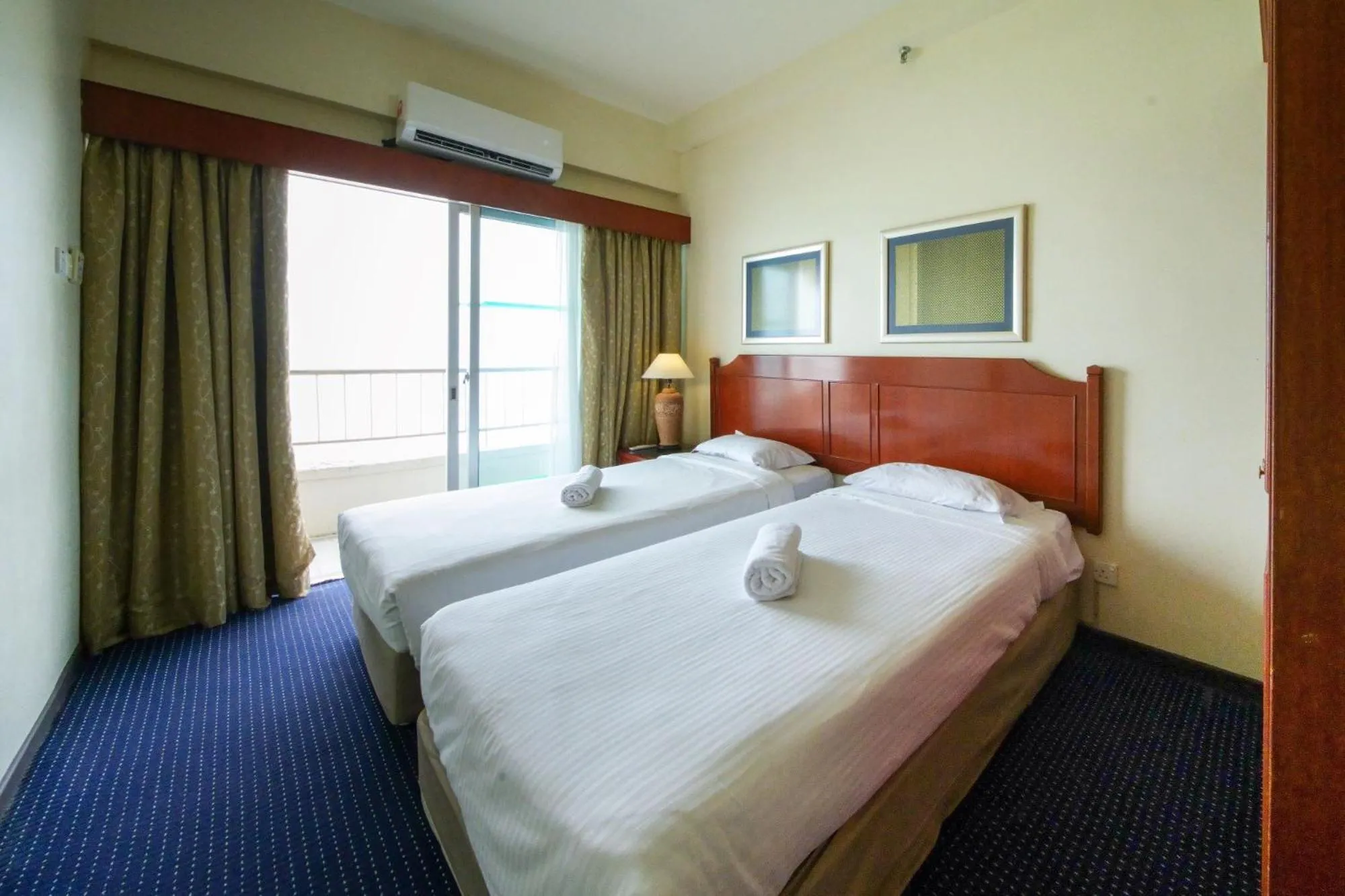 Bedroom in Rainbow Paradise Beach Resort
