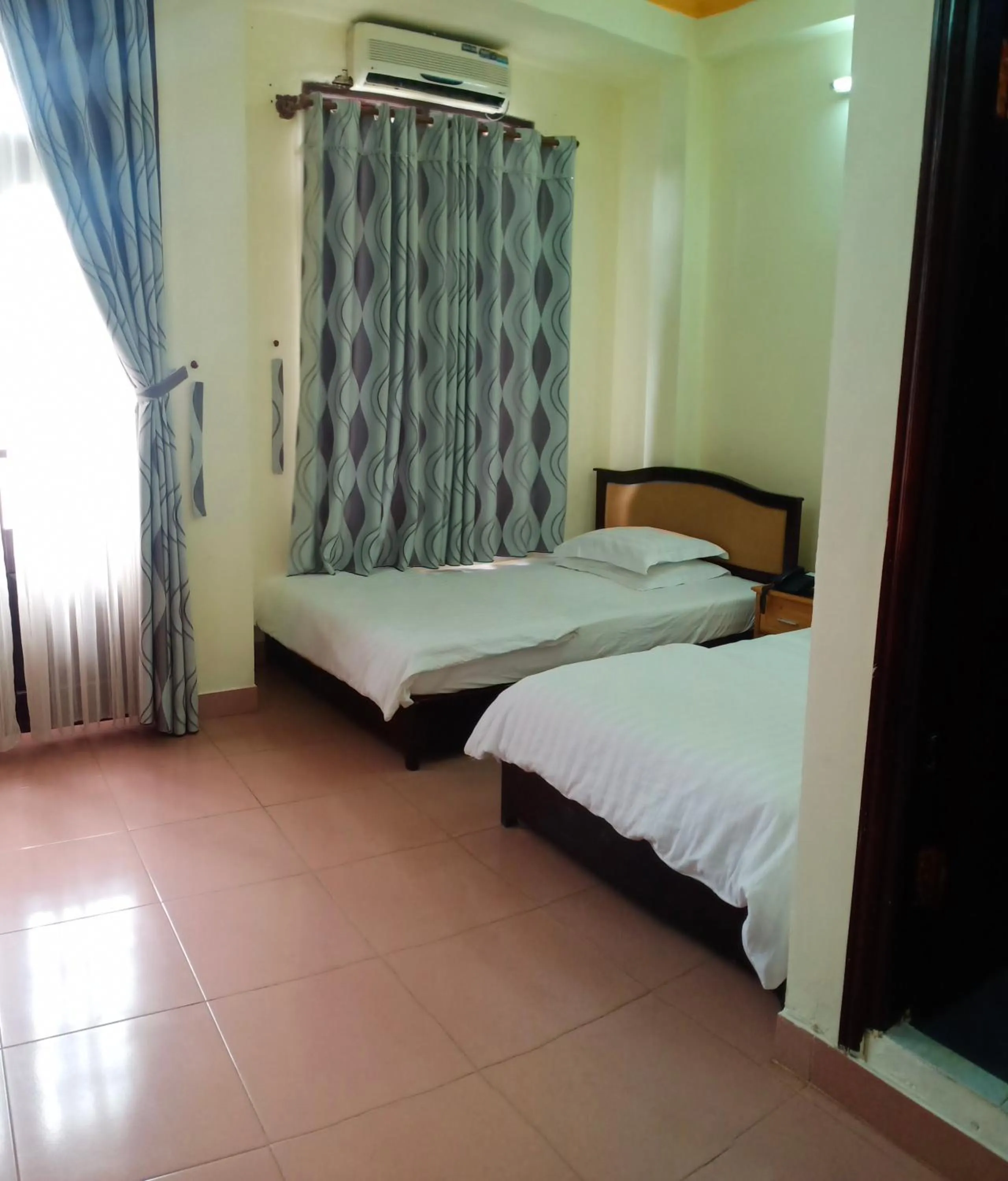 Bedroom, Bed in Cat Phu Hotel
