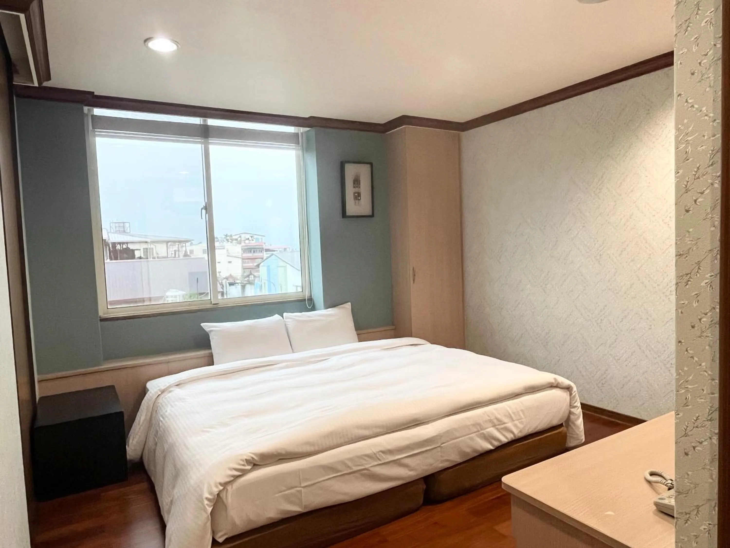 Bed in Xiu Shui Hotel