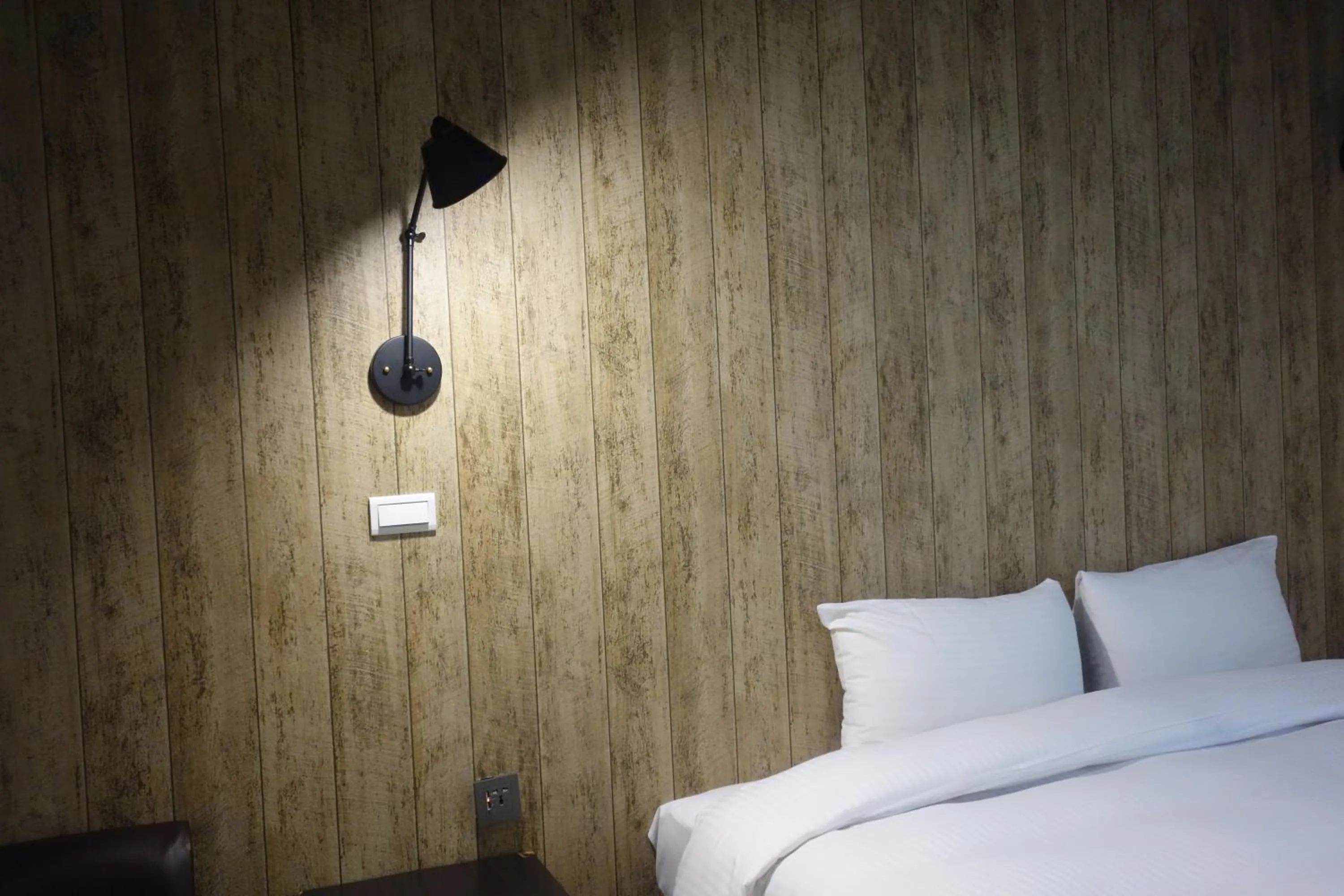 Bed in Xiu Shui Hotel