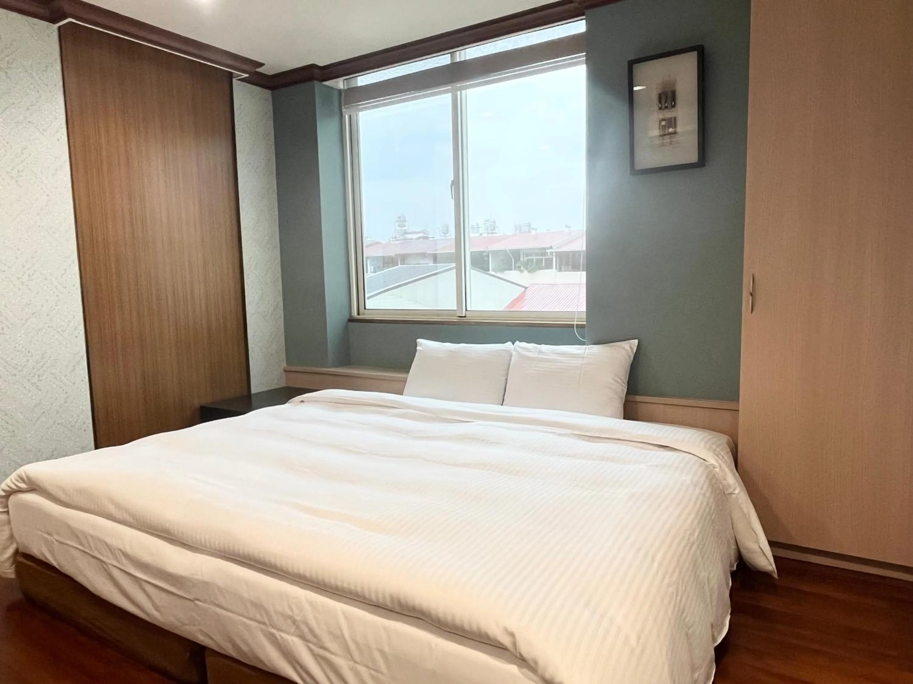 Bed in Xiu Shui Hotel