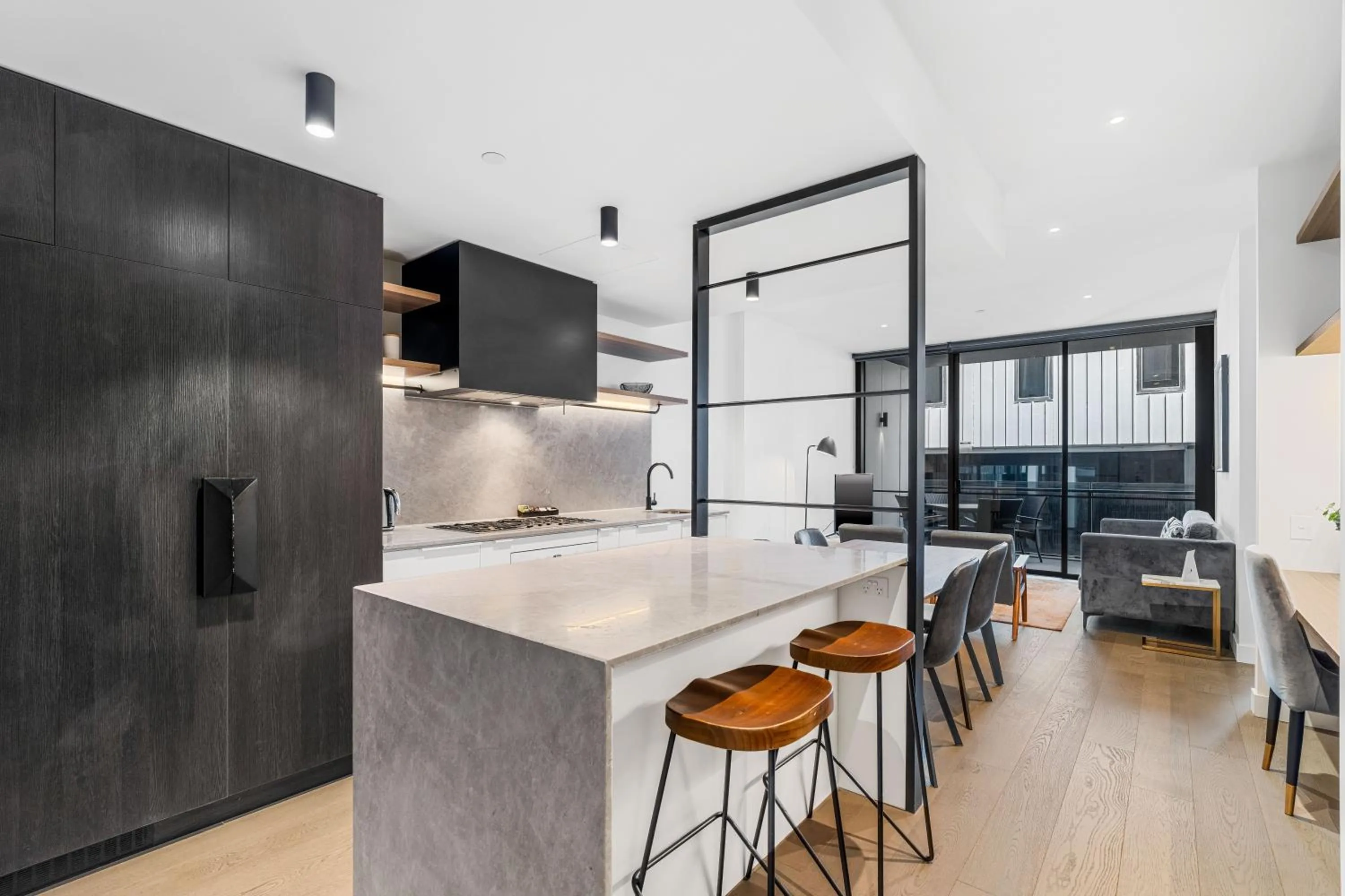 Kitchen or kitchenette in The Eminence Apartments by CLLIX