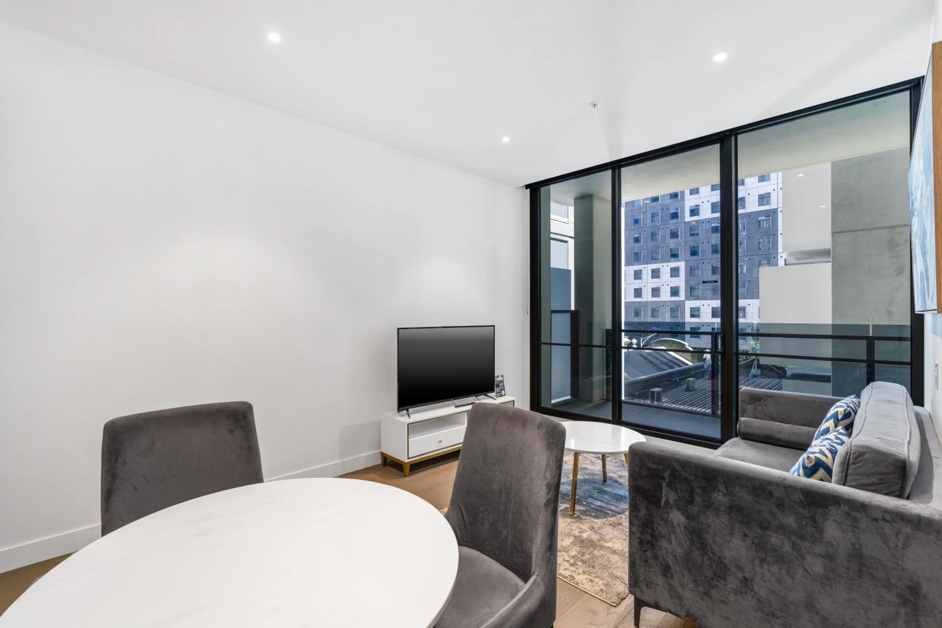 Living room in The Eminence Apartments by CLLIX