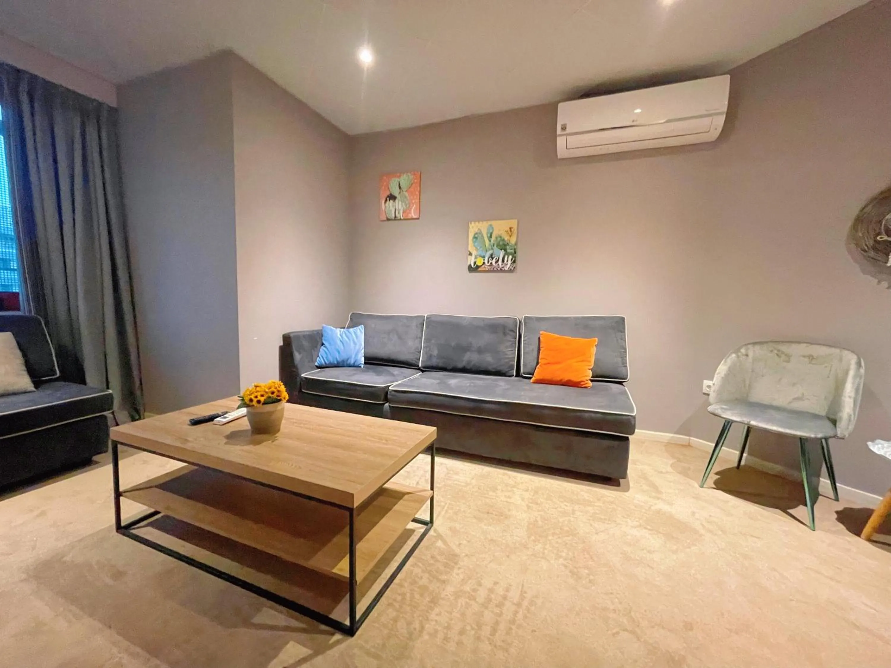 Living room in WSD Baia Acropolis Hotel Apartment