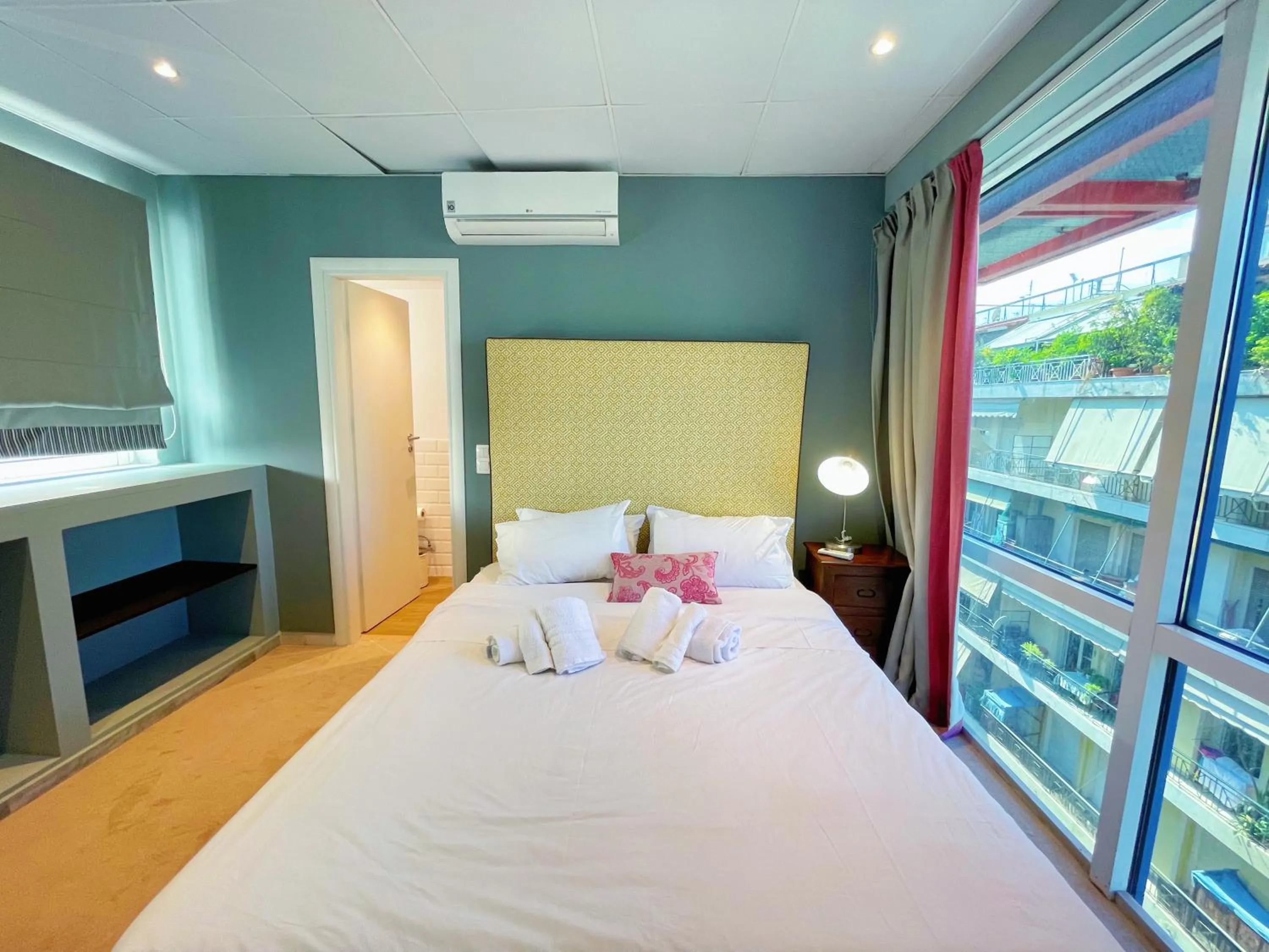 Bed in WSD Baia Acropolis Hotel Apartment