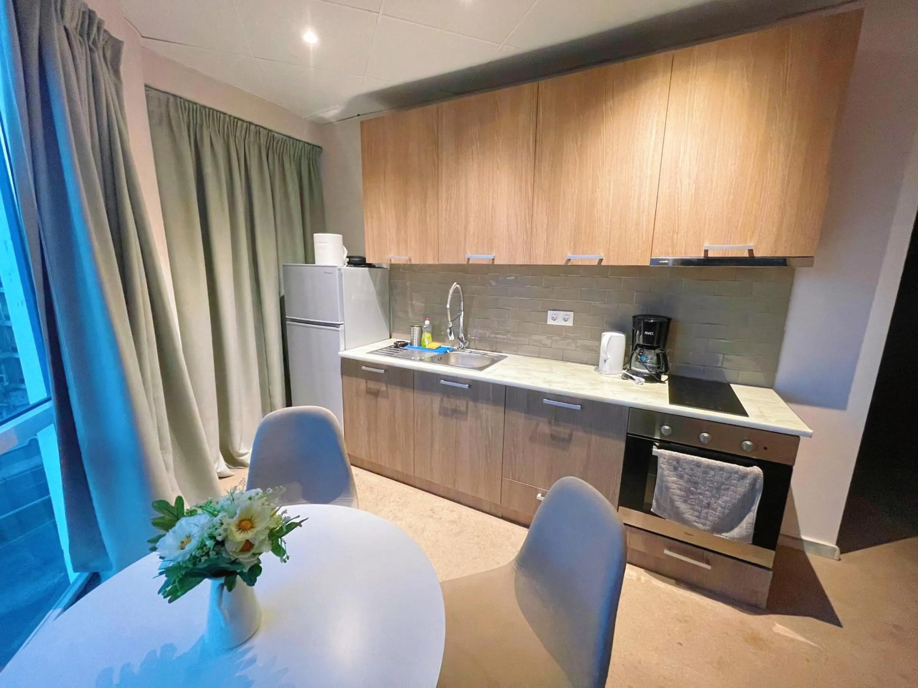 Kitchen or kitchenette in WSD Baia Acropolis Hotel Apartment