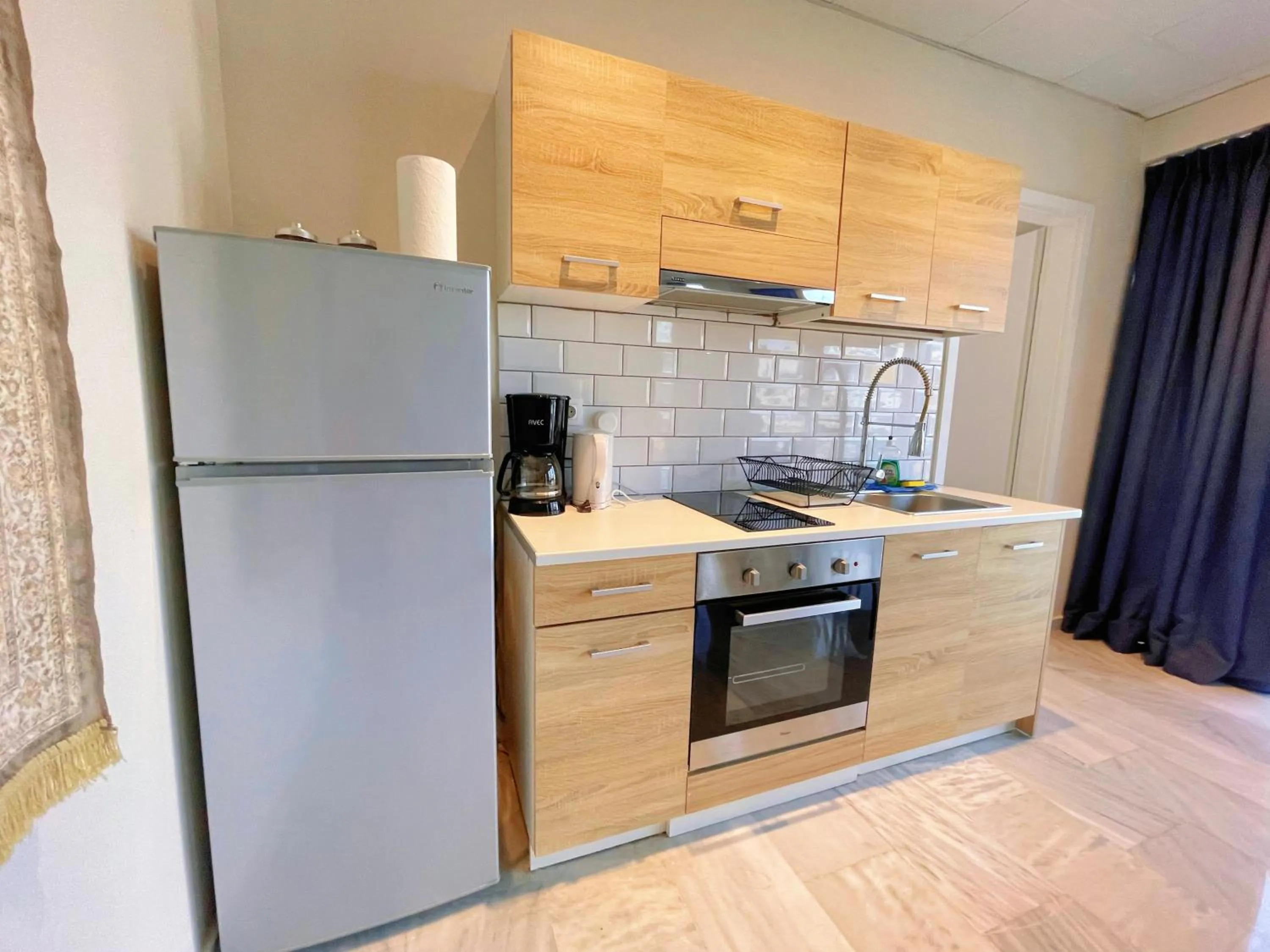 Kitchen or kitchenette in WSD Baia Acropolis Hotel Apartment