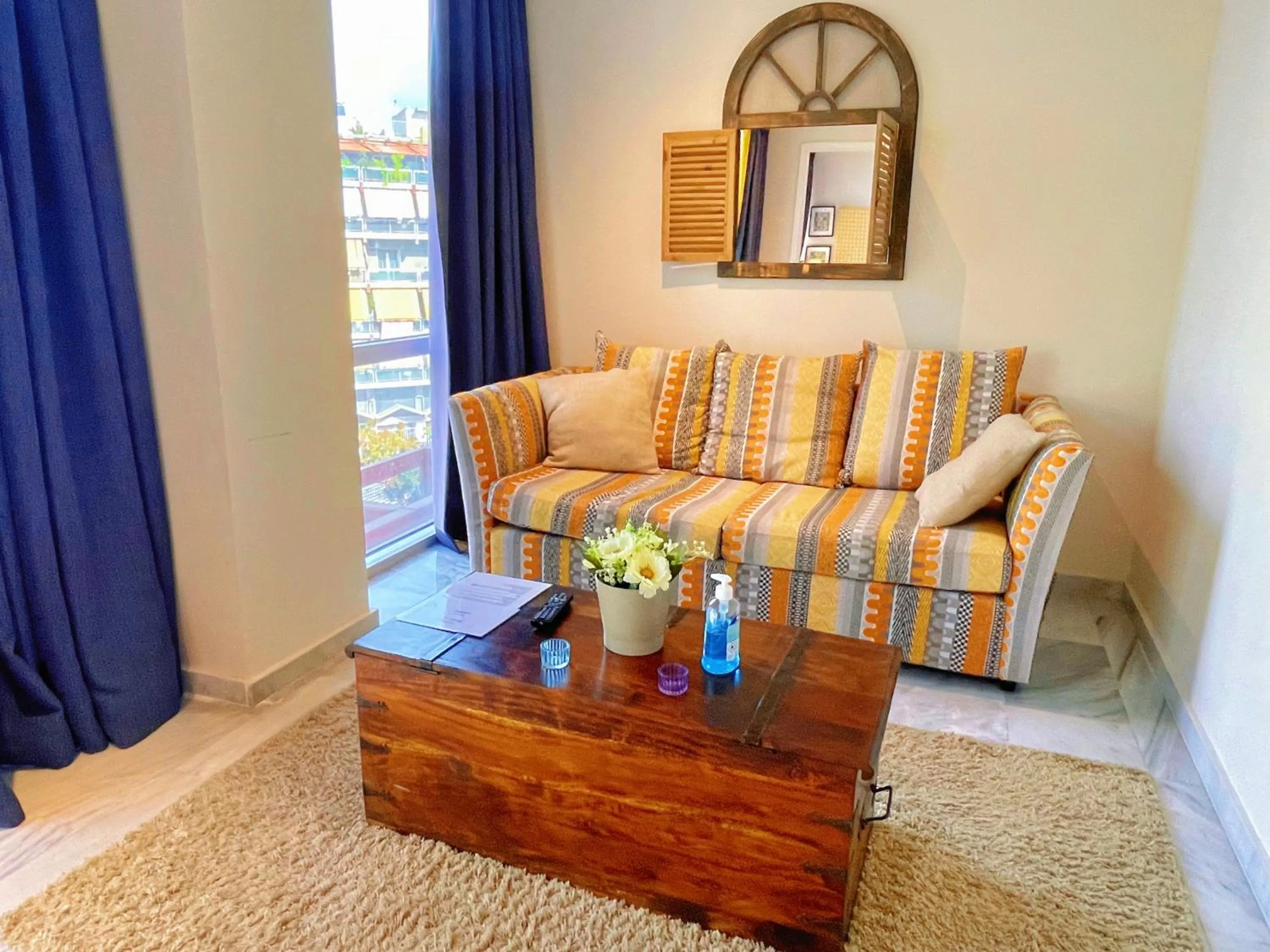 Living room in WSD Baia Acropolis Hotel Apartment