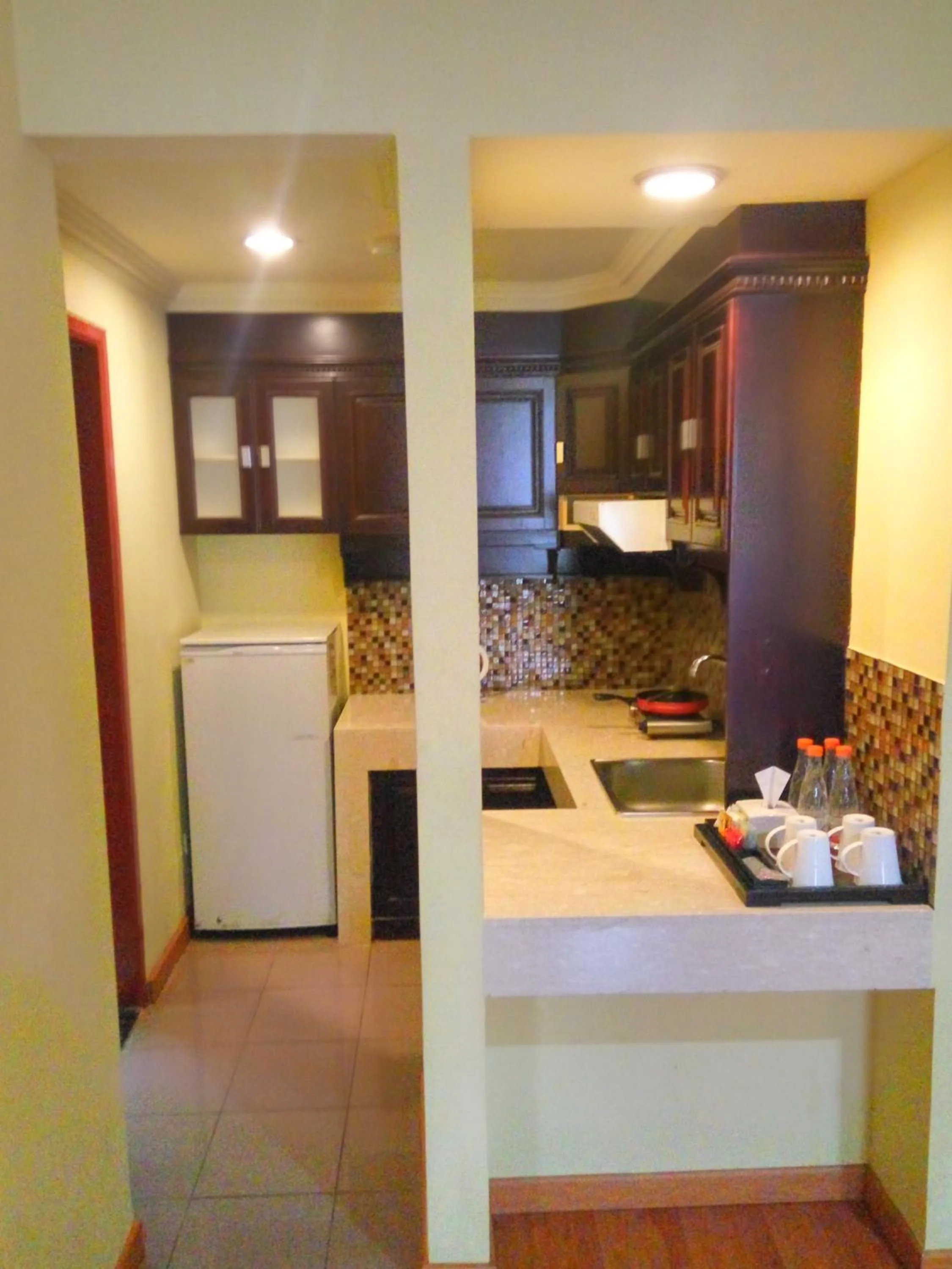 Kitchen or kitchenette in Sari Ater Kamboti Hotel Bandung