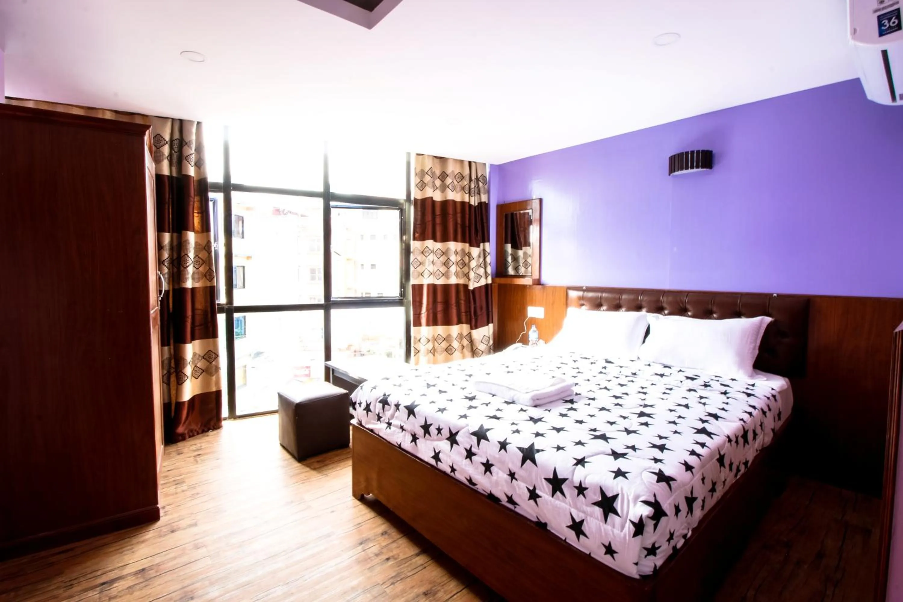 Bed in Everest Holiday Inn