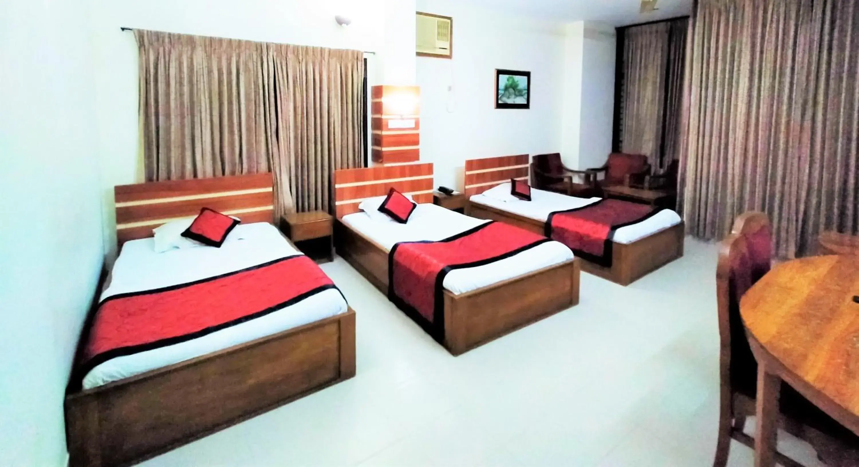 Triple Room in Hotel Supreme Triple Room in Hotel Supreme