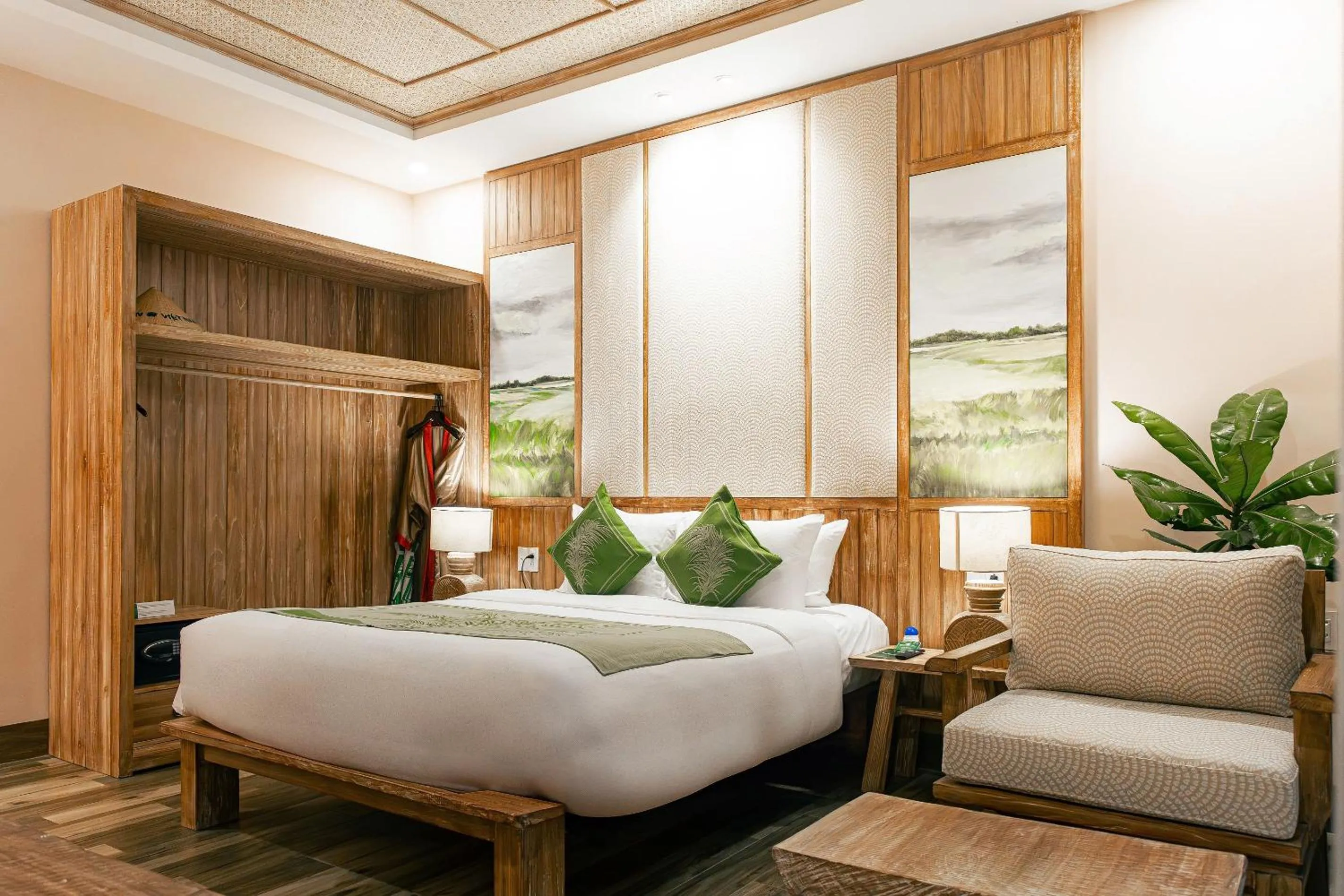 Bed in Palm Garden Beach Resort & Spa