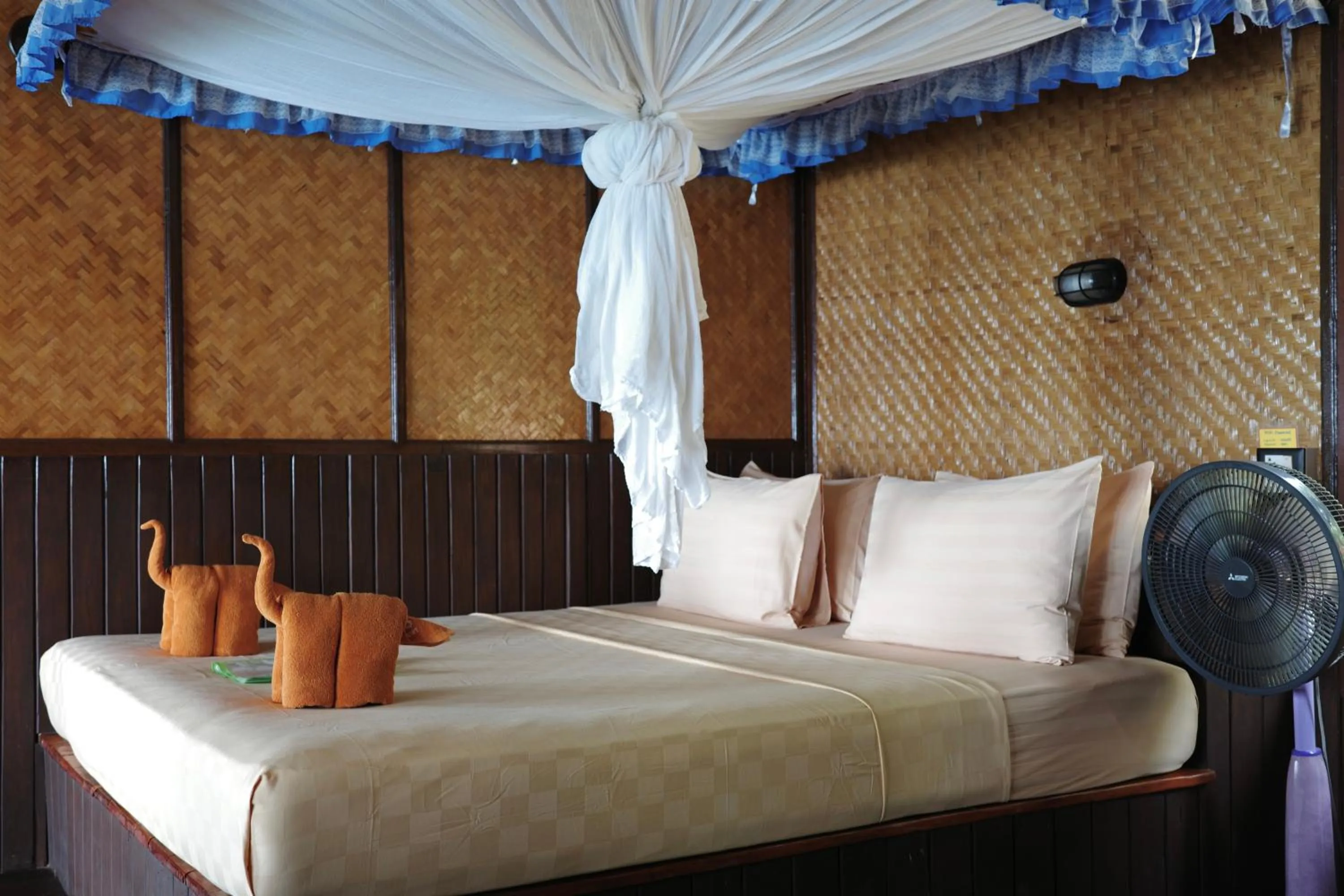 Bed in Phi Phi Relax Beach Resort