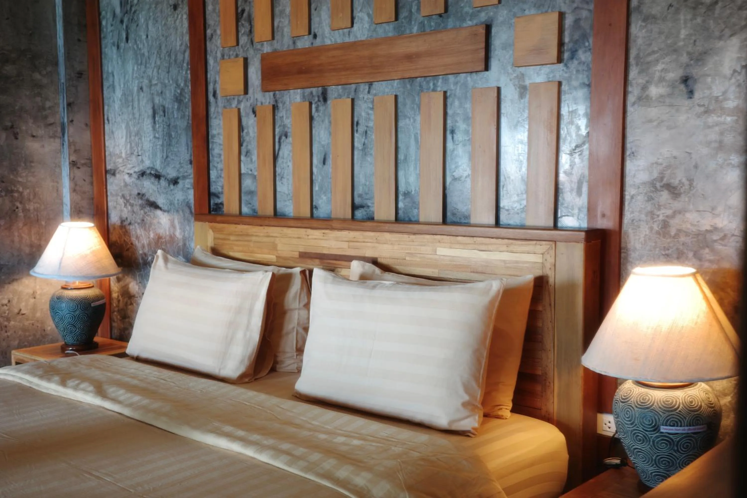 Bed in Phi Phi Relax Beach Resort