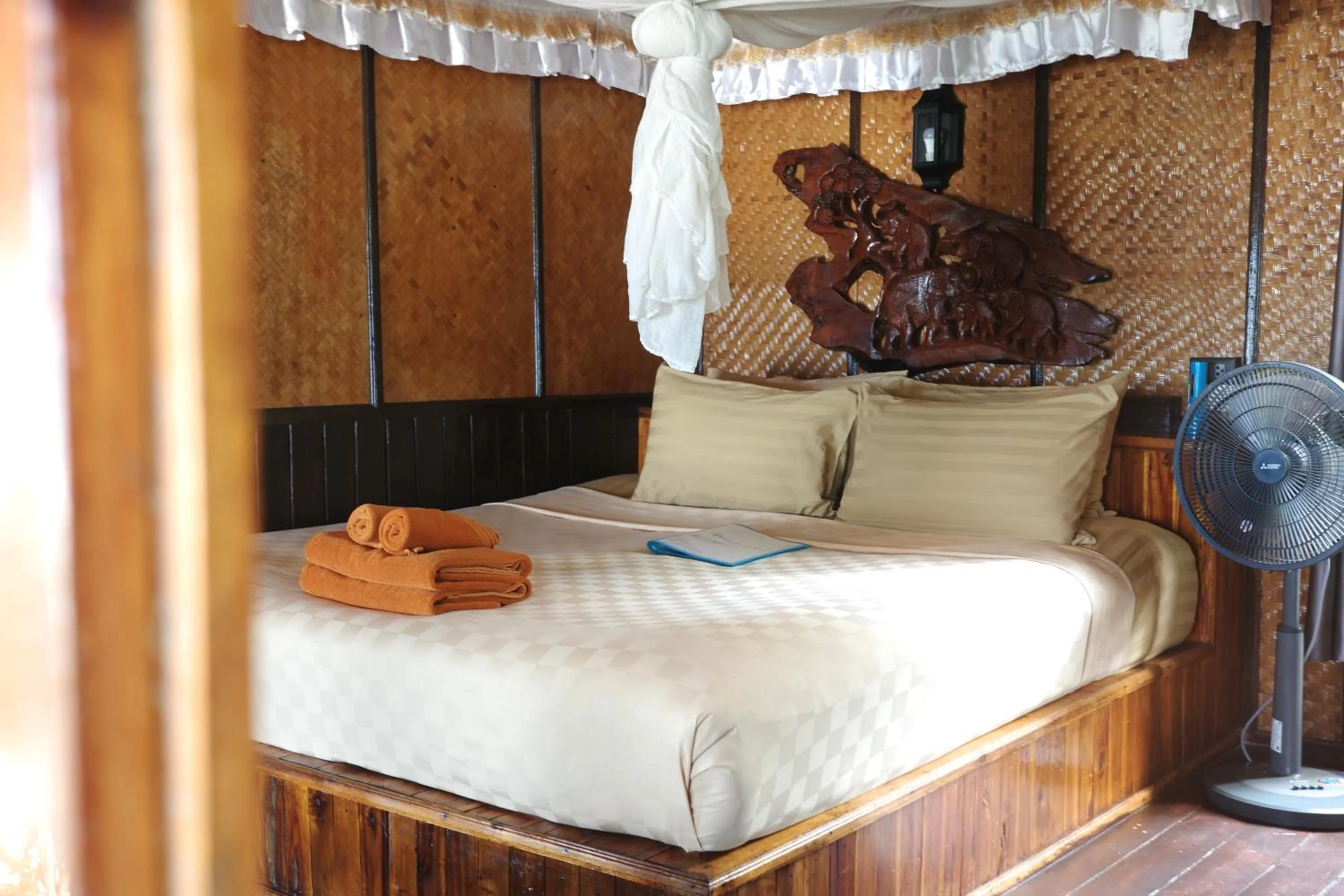 Bed in Phi Phi Relax Beach Resort