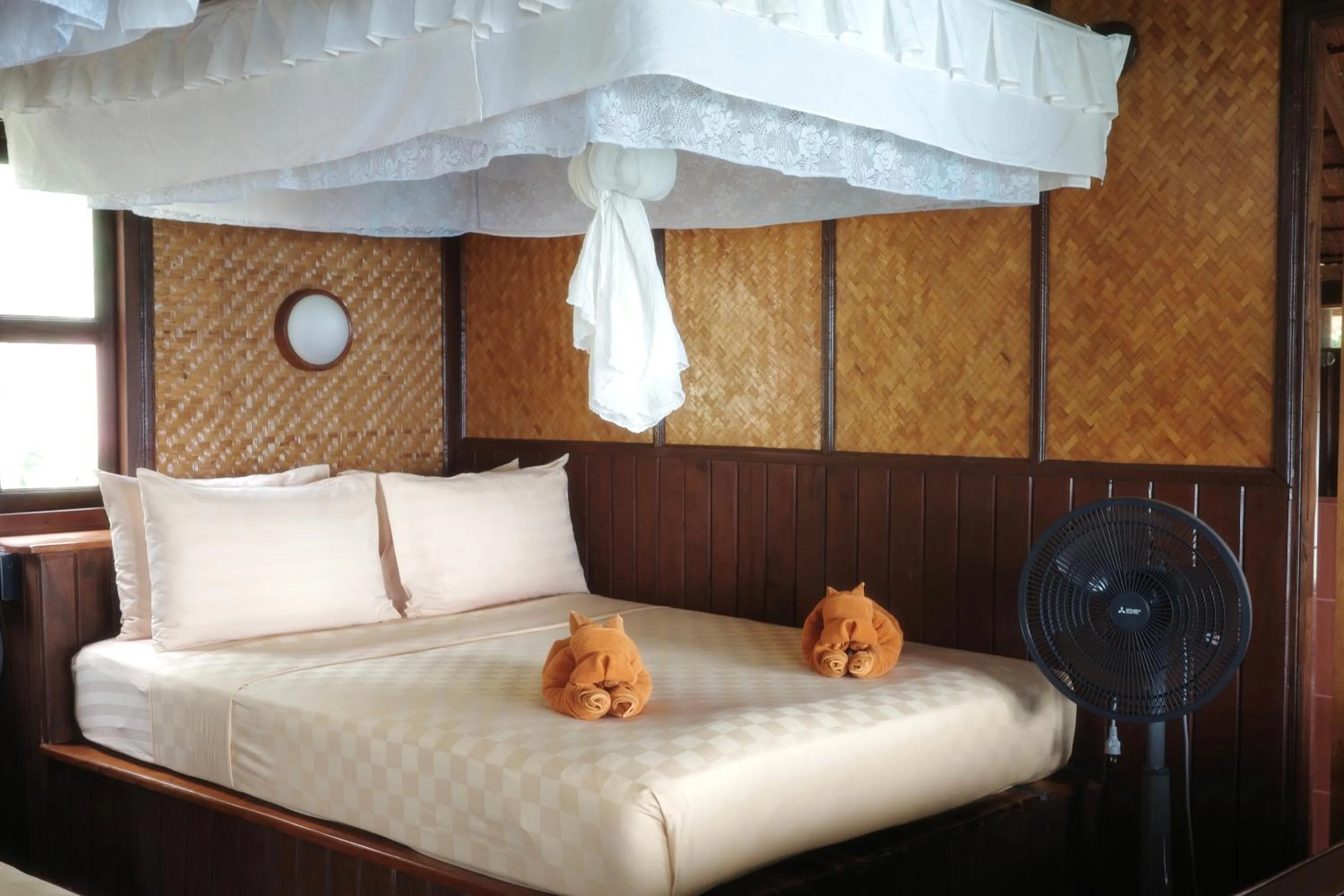 Bed in Phi Phi Relax Beach Resort