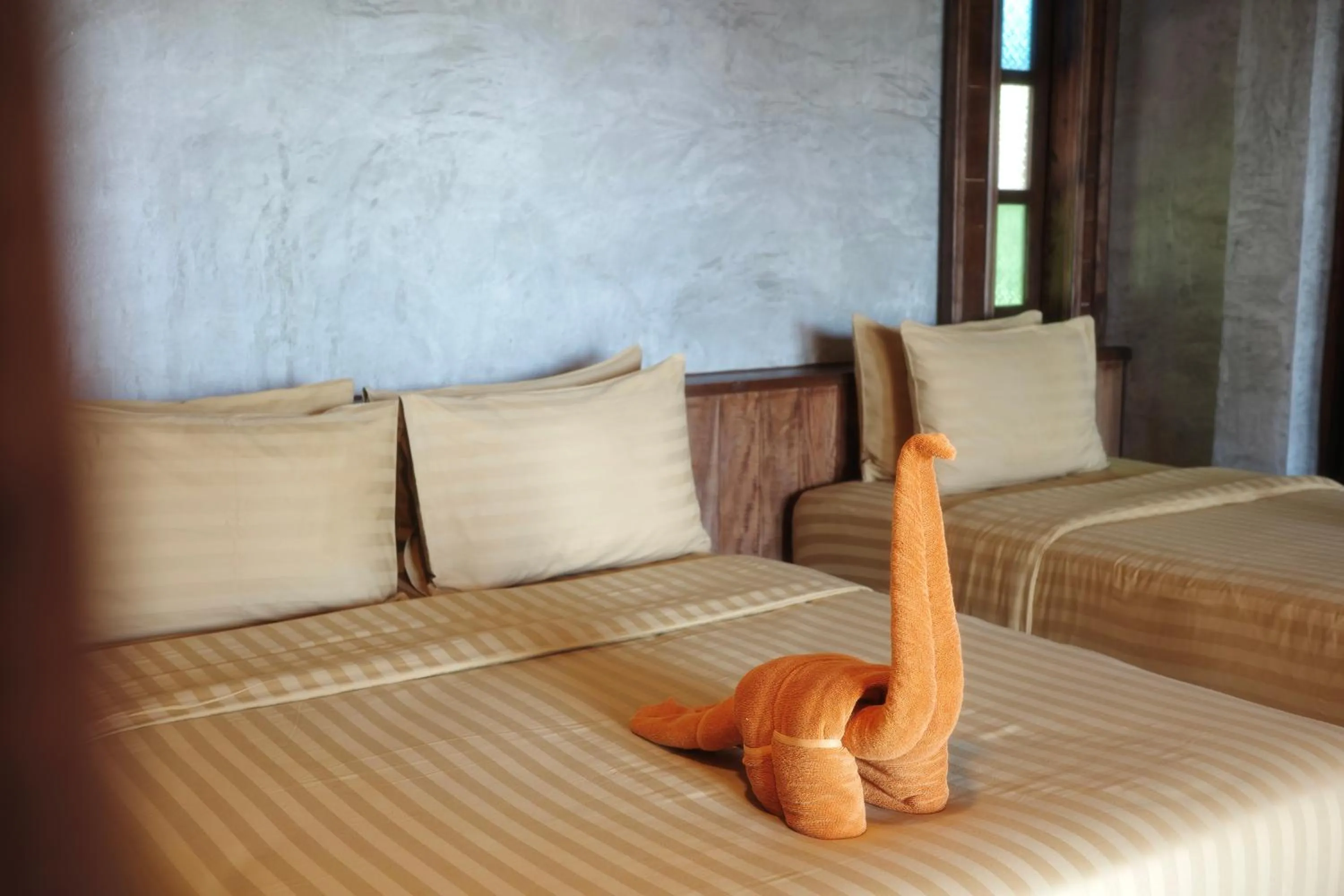 Bed in Phi Phi Relax Beach Resort