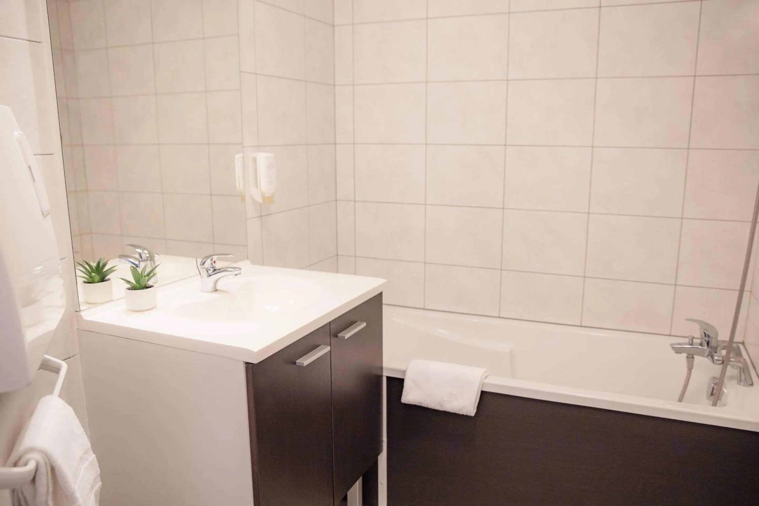 Bedroom in Comfort Aparthotel Mutzig Portes d'Alsace