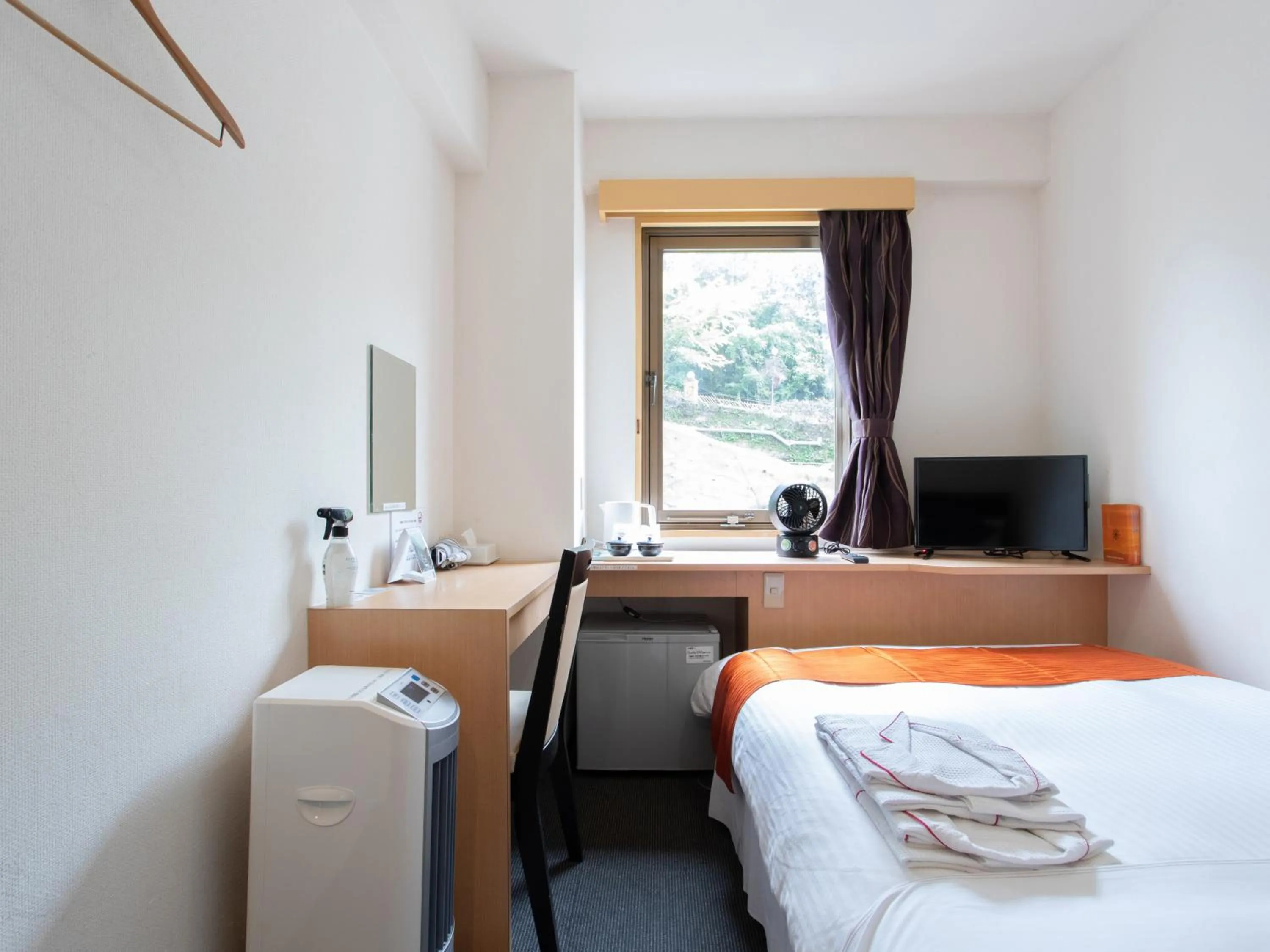 Bed in Tabist Sasebo Palace Hotel