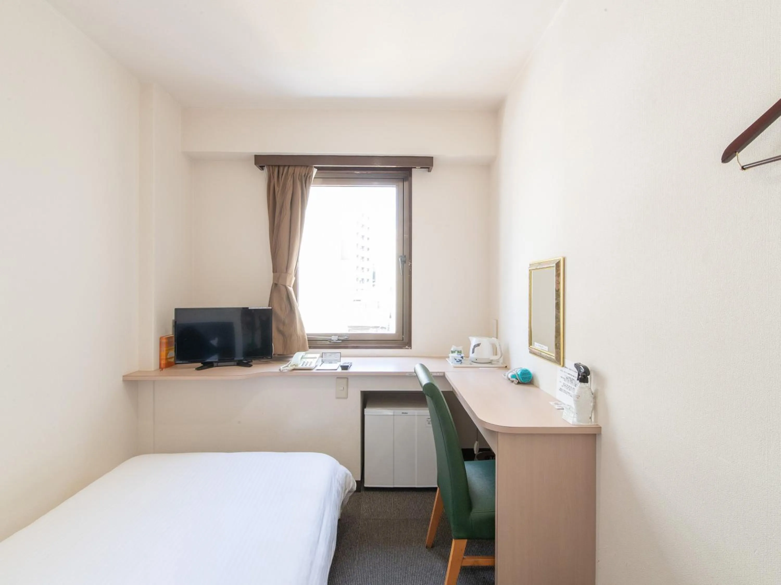 Bed in Tabist Sasebo Palace Hotel