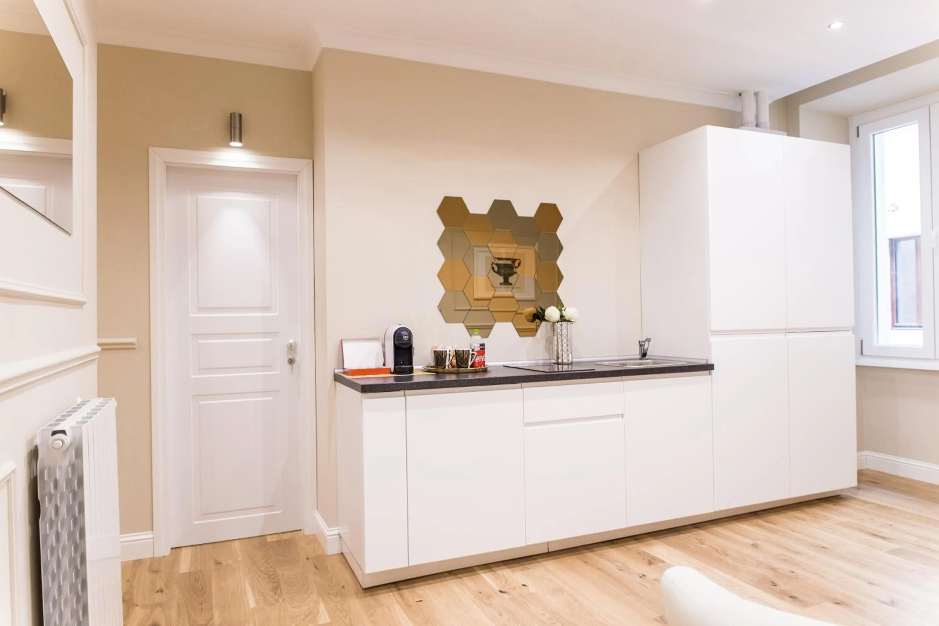 Communal lounge/ TV room in Nazionale Palace Suites