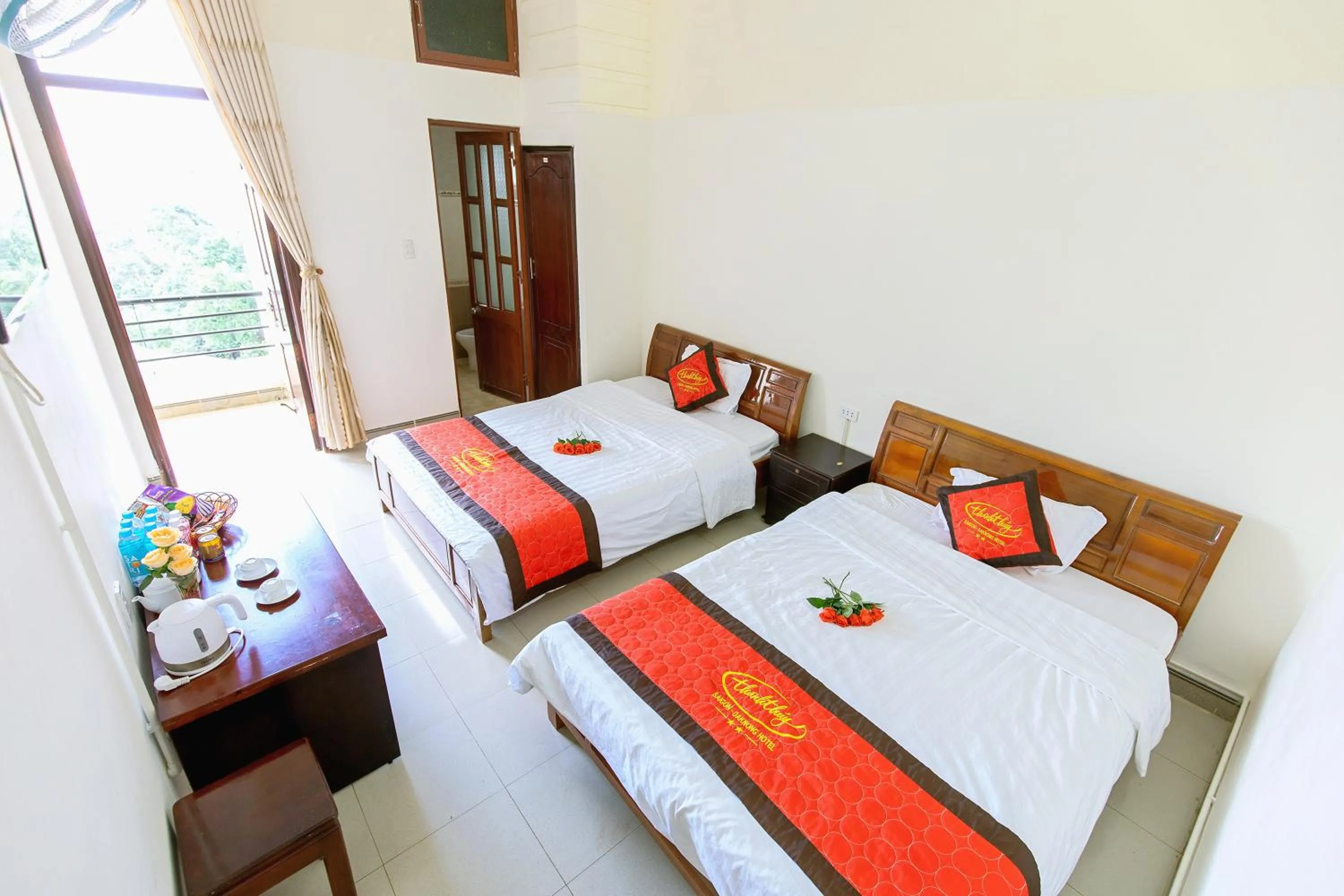 Photo of the whole room, Bed in Sai Gon Dak Nong Hotel