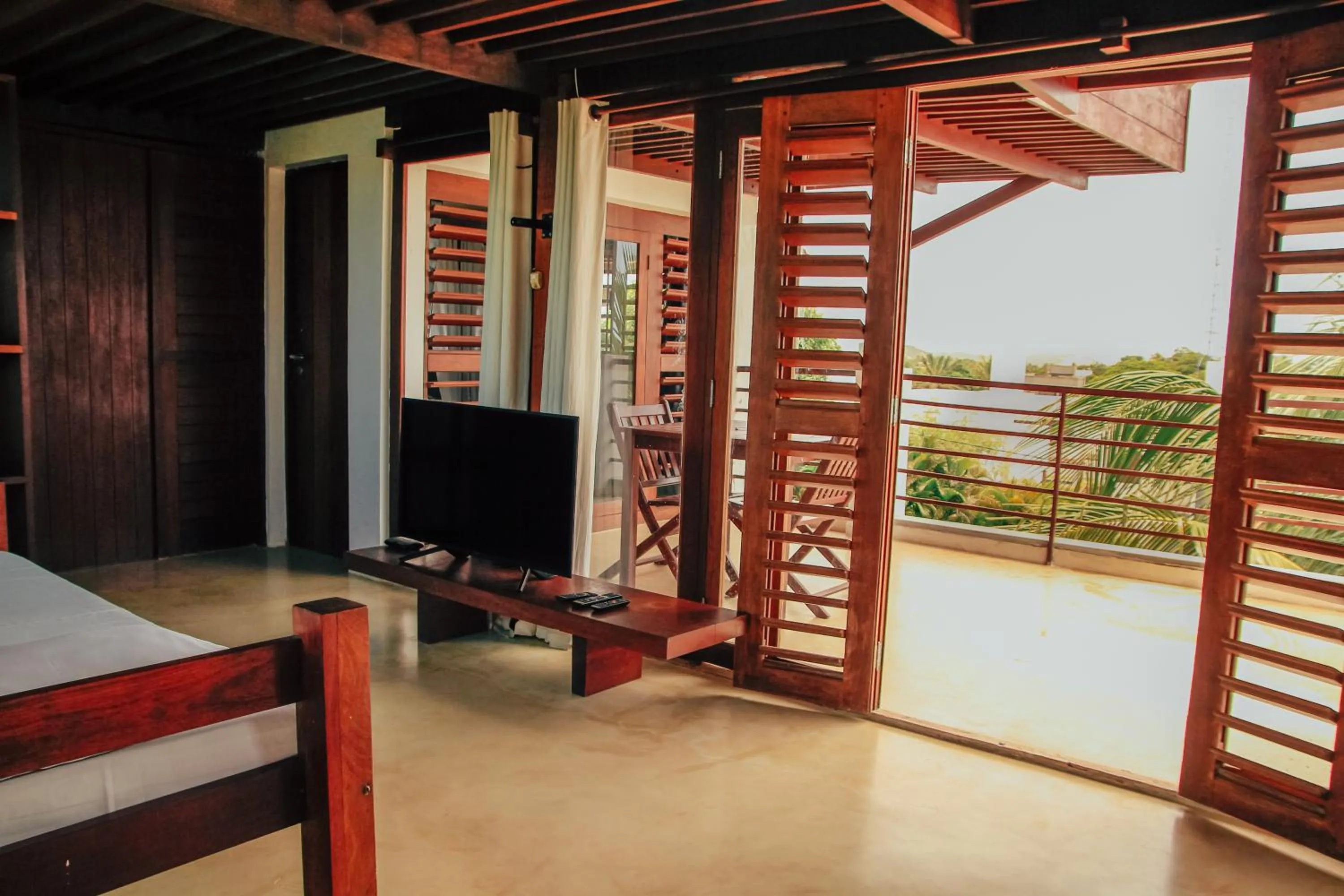 Communal lounge/ TV room in Pipa Panorama Aparthotel