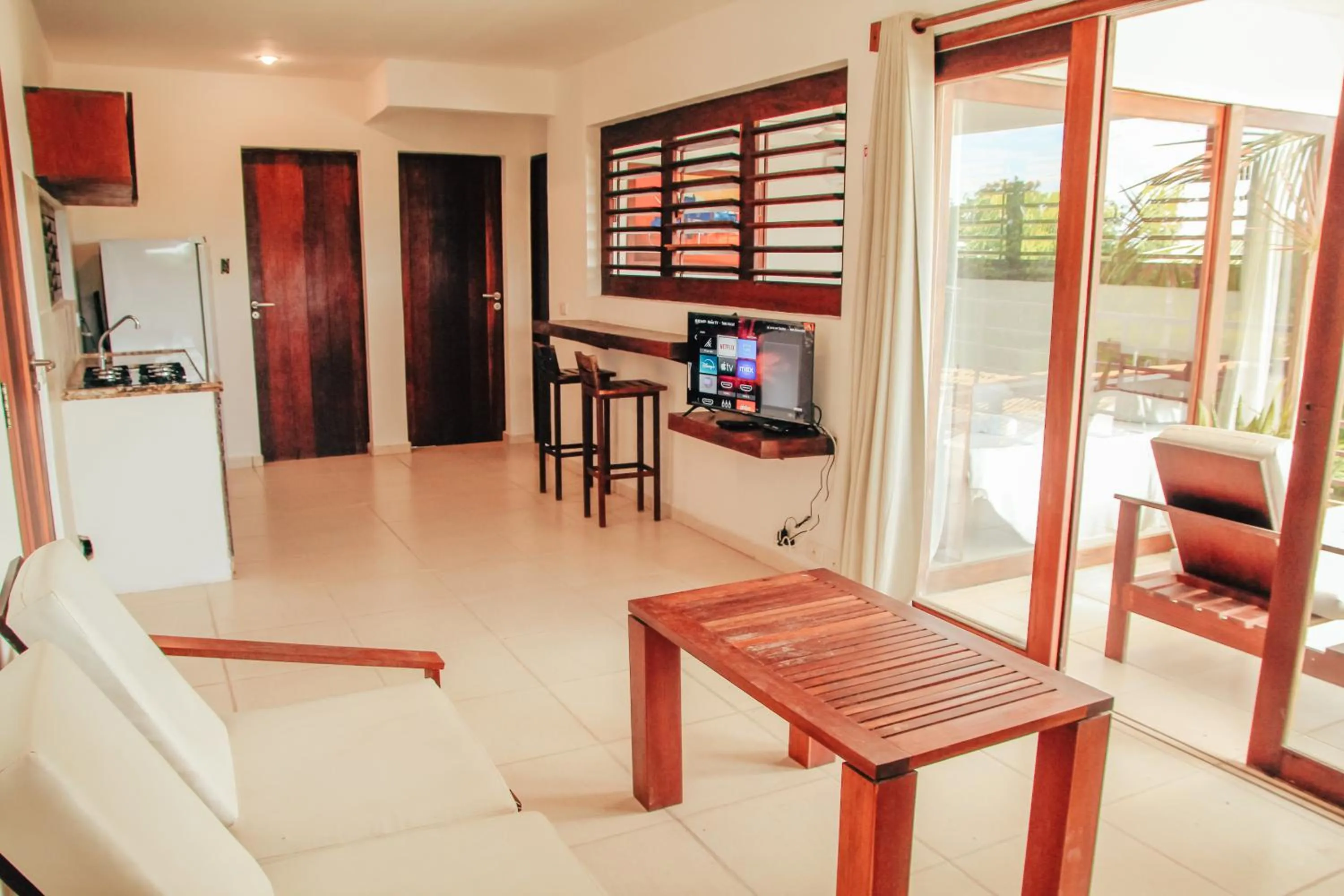 Communal lounge/ TV room in Pipa Panorama Aparthotel