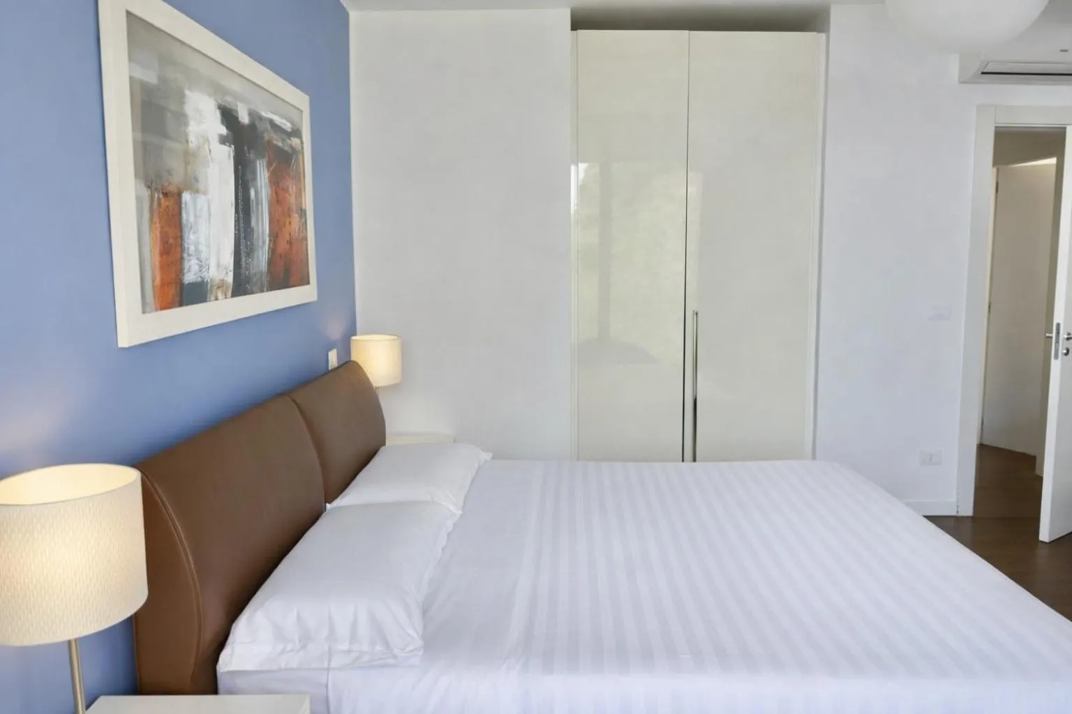 Bed in Isola Bella Infinity Suites