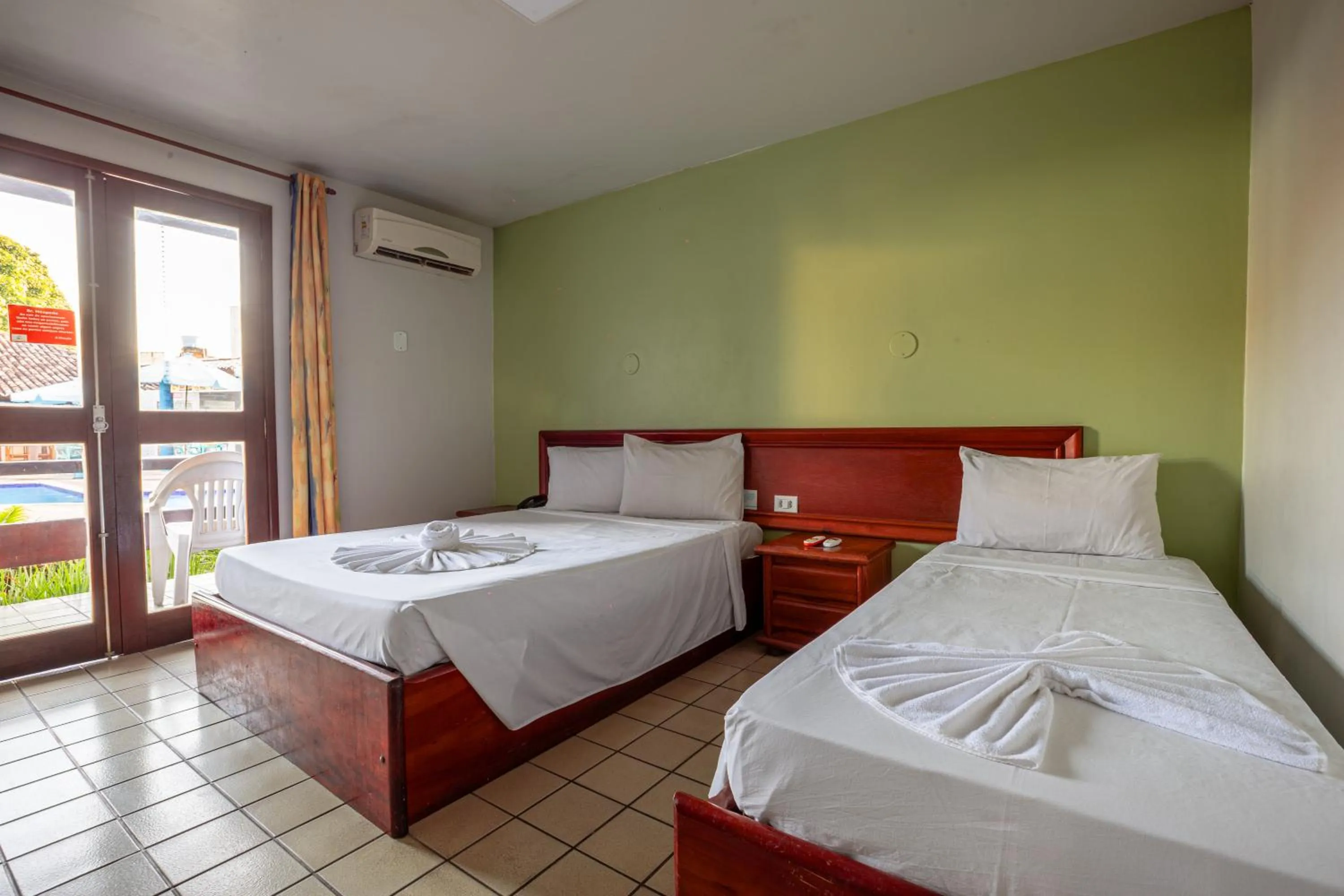 Bedroom, Bed in Rede Andrade Estrela Dalva Centro Hotel