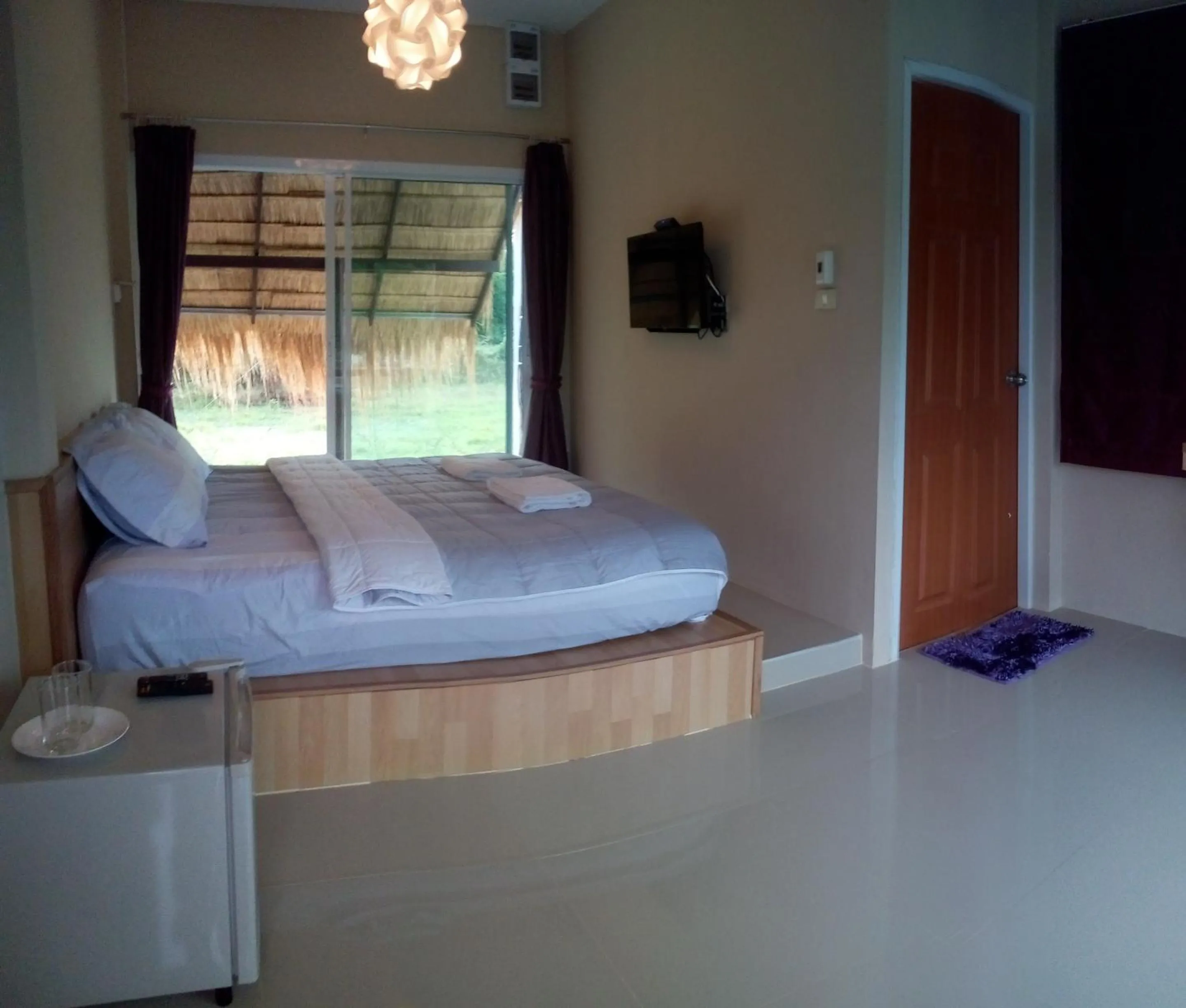 Bed in Suwi Coco Ville Resort