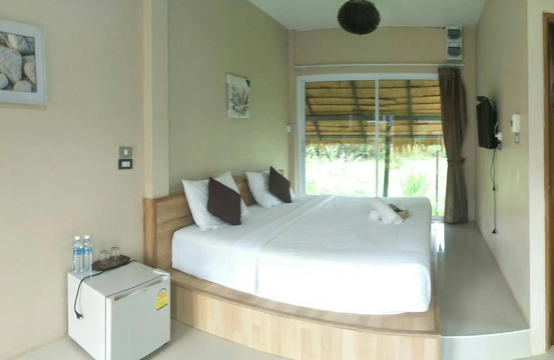 Bed in Suwi Coco Ville Resort