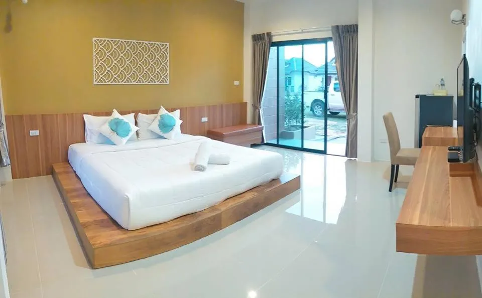 Bed in Suwi Coco Ville Resort
