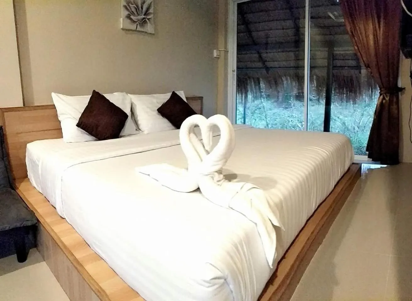 Bed in Suwi Coco Ville Resort