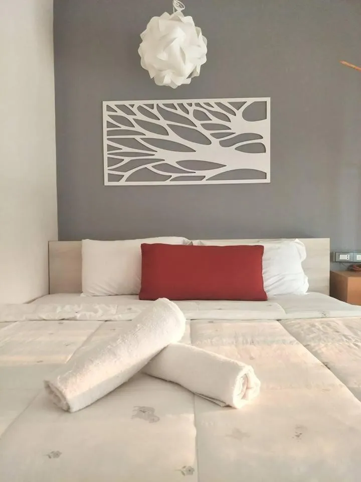 Bed in Suwi Coco Ville Resort