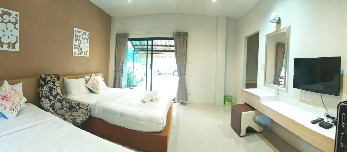 Bed in Suwi Coco Ville Resort
