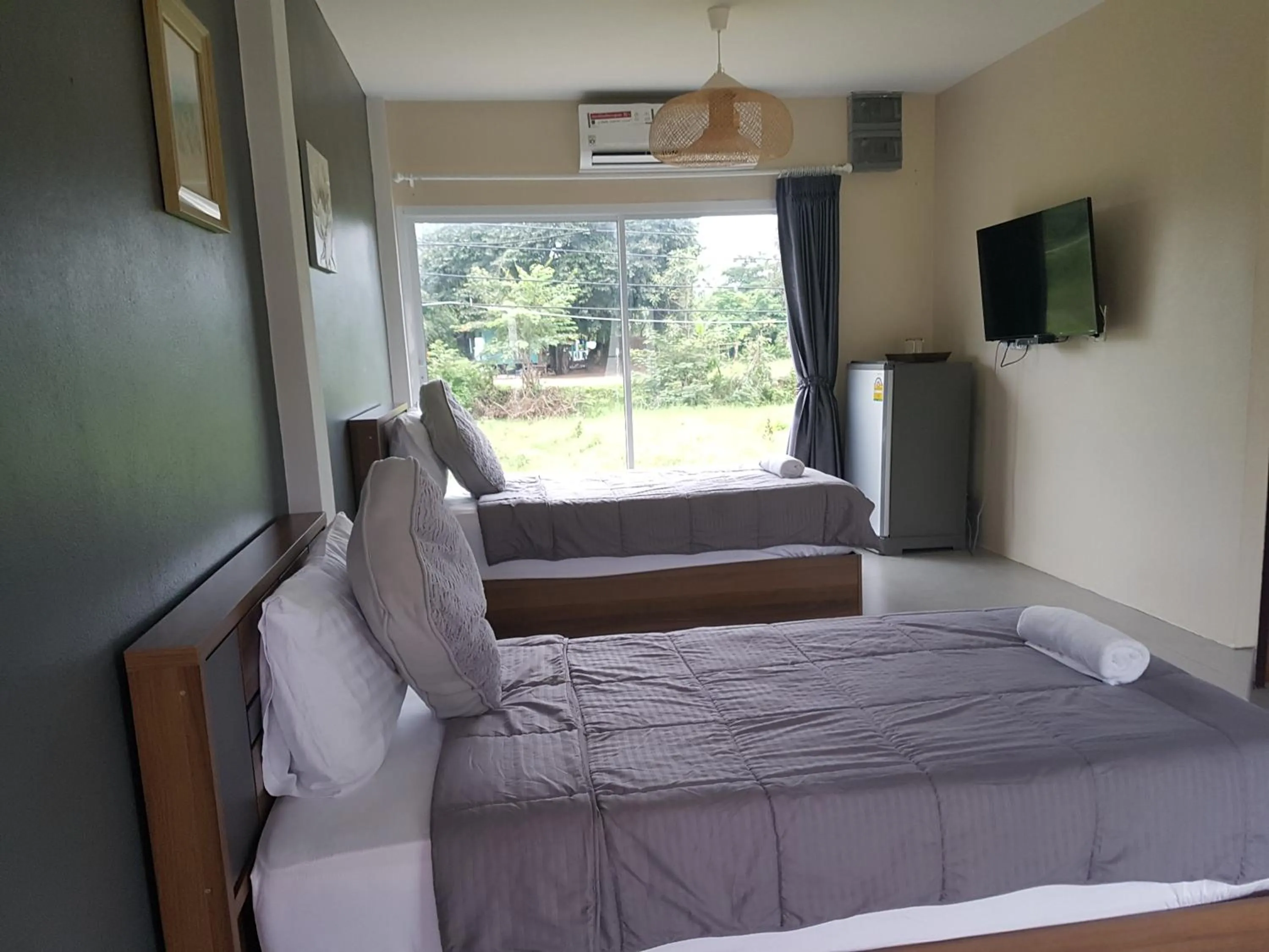 Bed in Suwi Coco Ville Resort