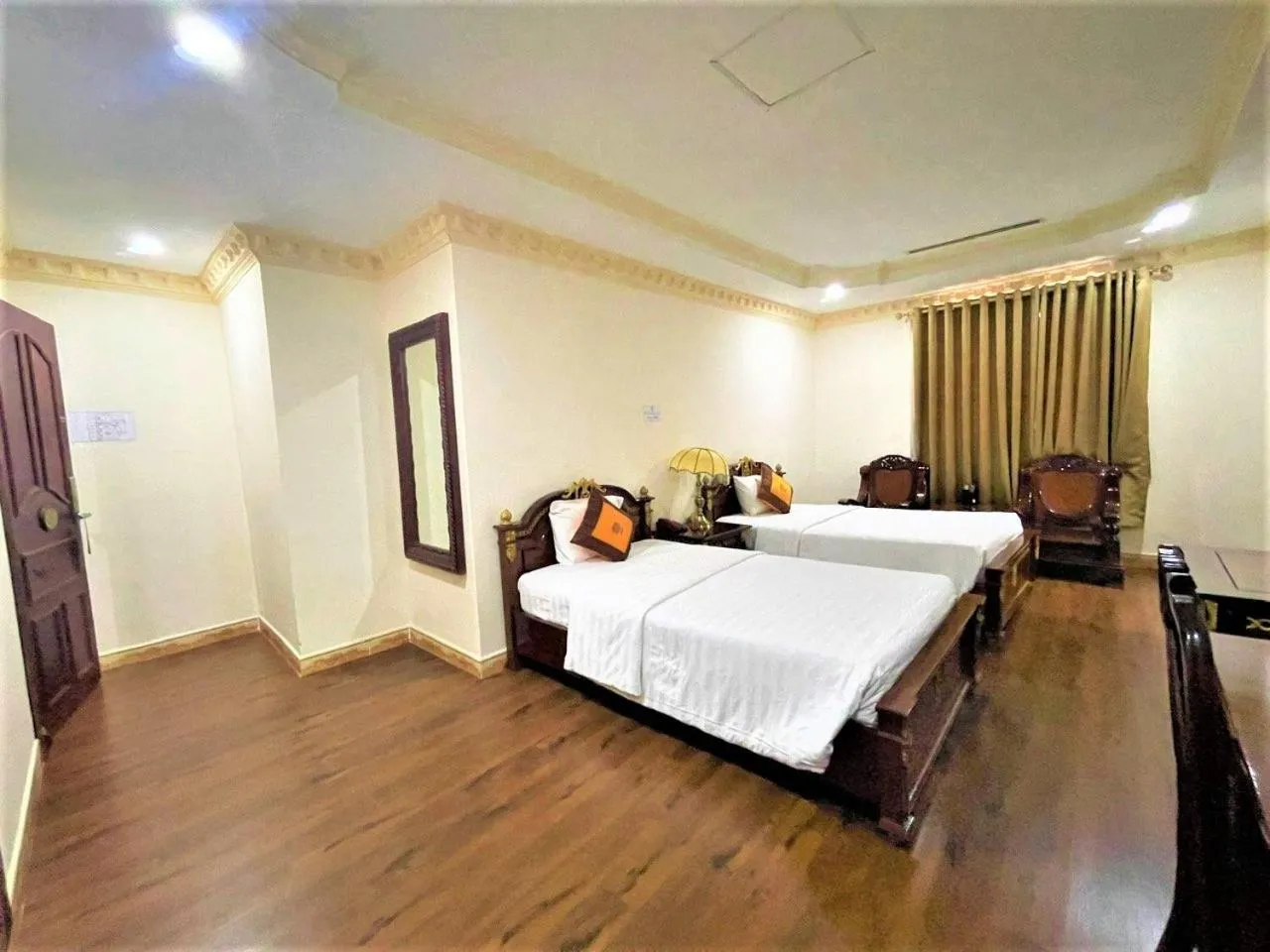 Bed in New Pacific Hotel