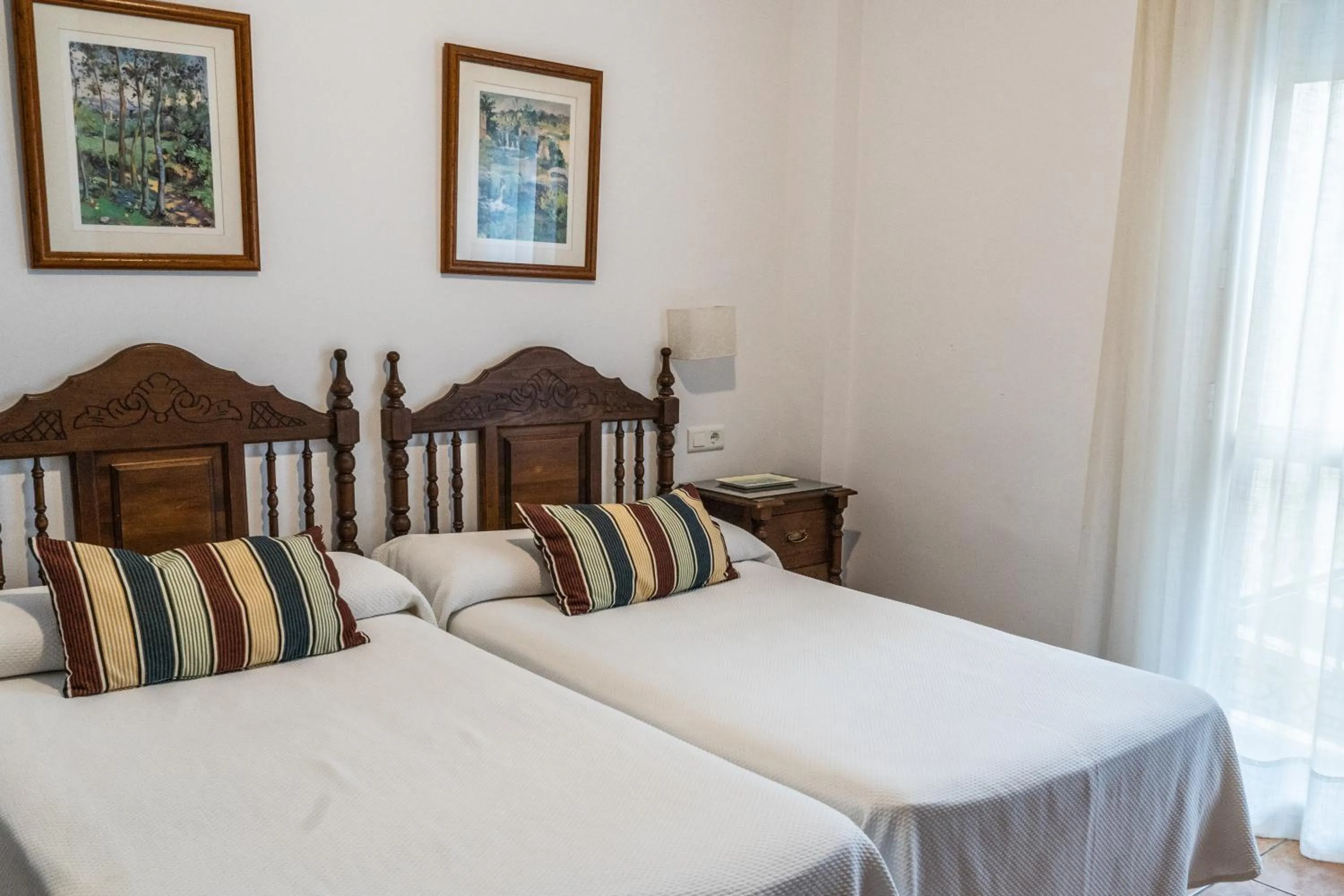 Bed in Hostal Marissal by Dorobe