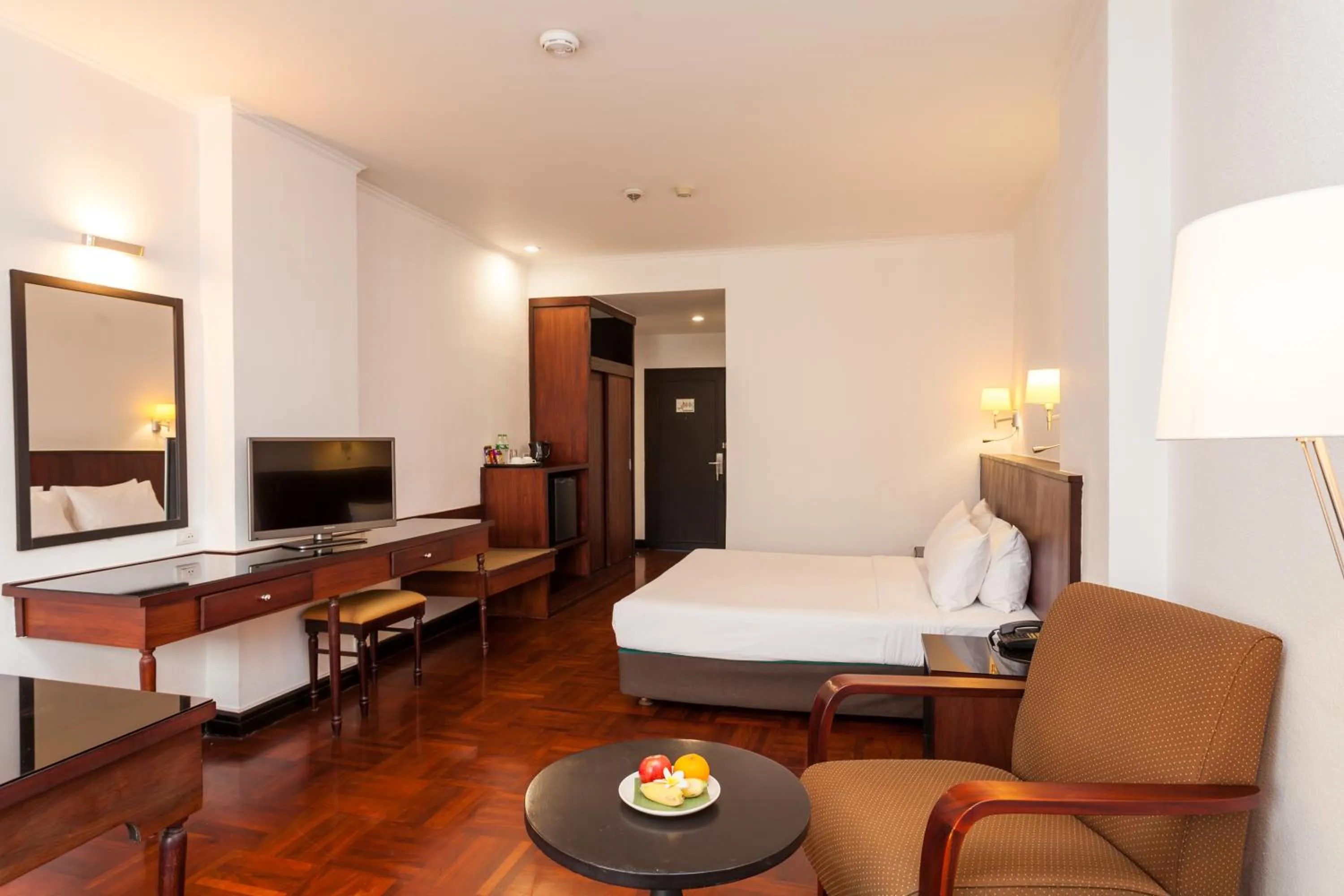 Photo of the whole room, Bed in Le Charme Vientiane Hotel