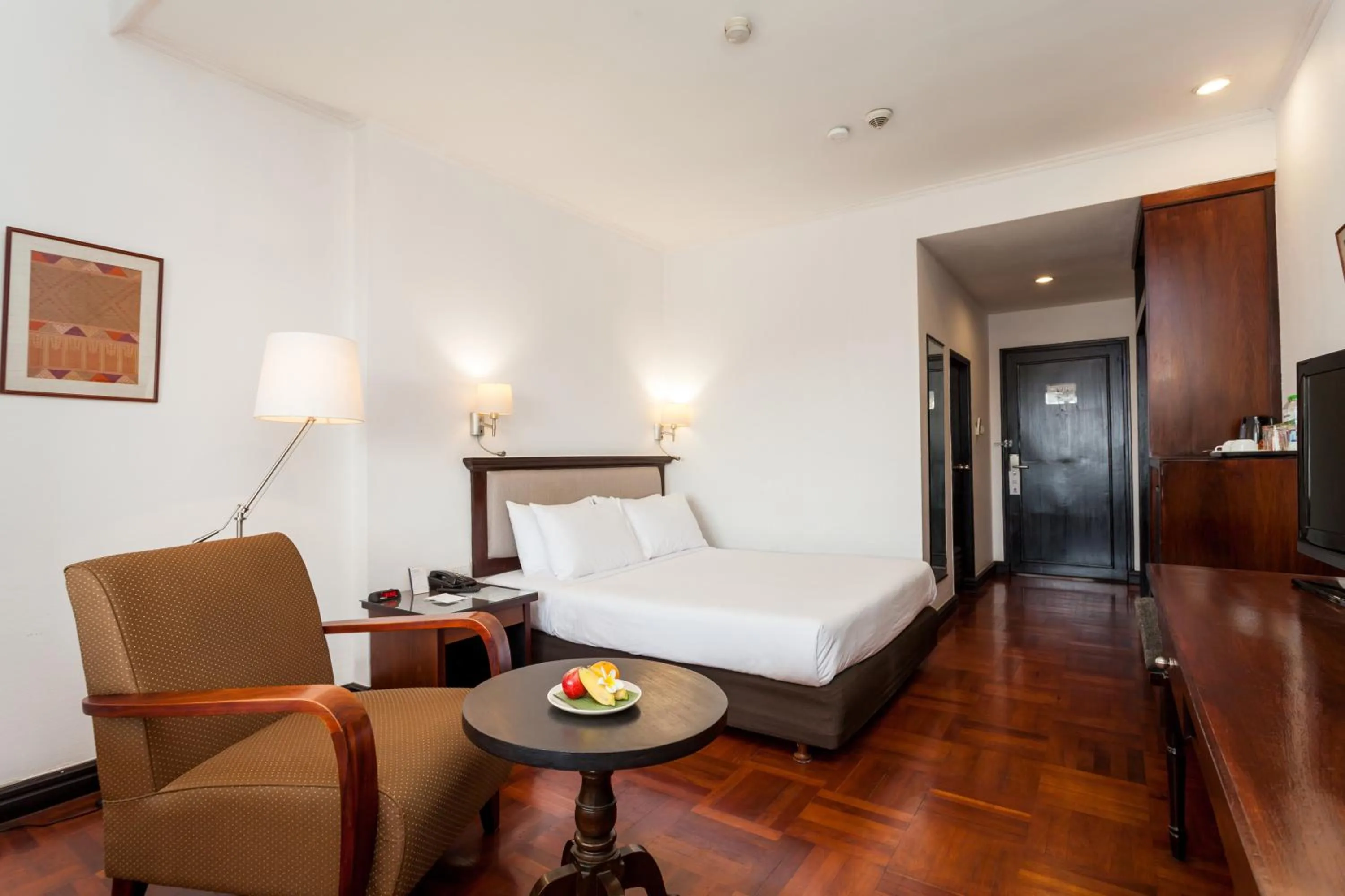 Photo of the whole room, Bed in Le Charme Vientiane Hotel